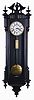 F. Kroeber Clock Co., New York, "Vienna Regulator No. 47", weight driven movement in an ebonized wall case, porcelain dial, fretted minute and hour hand, and a seconds hand below 12.