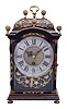 J. P. Huguenin, La Chaux de Fonds, "pendule Neuchateloise" small bracket timepiece in an ebonized wood case with fretted and engraved brass overlay, duration of crown wheel movement approx. 2 and half days.
