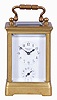 France, for H. Arnold, Budapest, a miniature carriage timepiece with alarm, mignonette #1 size Obis case with beveled glasses, Arabic numeral white enamel dial, blued steel hands, 8 day brass movement with lever platform, the alarm sounding on a coiled gong concealed in the base
