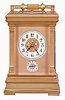 France, a large, Anglaise cased carriage clock with grand sonnerie striking, the glazed, gilt case with molded top and base, the corners with fluted pilasters, Arabic numeral white enamel dial with gilt center and mask, blued steel distaff hands, 8 day time, strike, and alarm movement with lever platform, sounding grand or petit quarters in passing, and repeating the last hour and quarter on demand