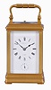 Margaine, Paris, for Henry Capt, Geneva, a Cannelee cased hour repeating carriage clock, glazed, gilt case with molded top and base, signed Roman numeral white enamel dial, blued steel spade and poker hands, 8 day time, strike, and alarm movement with lever platform, repeating the last hour on demand, the back plate with Margaines mark
