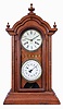 National Calendar Clock Co.,"Leader" shelf clock with a spring driven, 8 day, time and strike movement (New Haven Clock Co.) and a simple calendar mechanism in a walnut case.