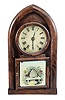 Brewster & Ingrahams, Bristol, Conn., 8 day, time and strike, spring brass movement round gothic or beehive clock.