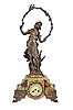 France, Green Onyx Figural Clock, with cream colored arabic numeral dial set within a brass bezel with beveled glass, patinated spelter young lady figure titled "Doux Retour" or Sweet Return celebrating the annual rite of spring with the figure holding a garland of flowers with a perched bird standing above the dial, green onyx multi-part case on cast and gilt classical feet, round eight day French time and strike, spring powered movement with coiled gong for hour strike and pendulum.