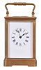 Boston Clock Co., Boston, Mass., 8 day, time and strike tandem-wind carriage clock with balance platform mounted vertically on the back plate.