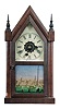 E. N. Welch Mfg. Co., Forestville, Conn. miniature steeple shelf clock with a spring driven 30 hour time and alarm movement in a mahogany veneered case.