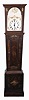 Germany, a Black Forest musical tall clock, 30 hour, time, strike and playing music on 21 pipes, three weight driven movement in a custom made oak case with brass appliques and a painted wooden dial featuring rampant lion in arch.