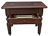 A music box table or stand of stained pine, including 3 (Three) Mermod Freres cylinders from an interchangeable box, width 11.2 inches