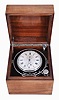 Parkinson & Frodsham, Change Alley, London, an early 19th century two day marine chronometer with later box, 11 jewel, free sprung fusee movement with Earnshaw's spring detent, the cut bimetallic chronometer balance with blued, helical spring, and diamond endstone, Roman numeral silvered dial with wind indicator, blued steel spade and poker hands, contained in a shock mounted, nickel plated bowl, with nickel plated gimbals and original key, serial #1332, mounted in a later, purpose made, polished curly mahogany box