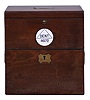 Dent, 61 Strand & 4 Royal Exchange, London, a good two day marine chronometer with Dent's staple balance, 11 jewel, free sprung fusee movement with Earnshaw's escapement, bimetallic staple balance with white helical spring and diamond endstone, Roman numeral silvered dial with wind indicator, blued steel spade and poker hands, contained in a brass bowl, and mounted in a gimballed mahogany and mahogany veneer box with brass furniture, the front with round plaque marked "Dent 46172", the inside of the lid with E. Dent & Co. label