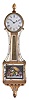 Patent Timepiece or "Banjo" Clock, Concord, Massachusetts, the mahogany veneered, gilded rope molded case with acorn finial over the zinc roman numeral dial, original reverse-painted glasses, the lower depicting "Aurora" on her festooned chariot driven by two winged horses set before a gleaming sunrise and framed within a geometric border, the waist glass flanked by brass side ornaments in gold, green and red frames gilt scroll work within a gilt border, below is a gilded pedestal with fluted acorn drop and eight balls, eight day brass movement with alternate train layout, cut-outs on front and back plates, and recoil escapement and regulated by a brass-faced lead backed pendulum bob and iron rod.