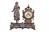 Ansonia Clock Co., New York, "Solo", 8 day, time and strike, spring brass movement figural mantel clock.