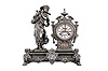 Ansonia Clock Co., New York, "Winter", 8 day, time and strike metal case figural mantel clock.