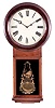 Seth Thomas Clock Co., Thomaston, Conn., "Regulator No. 2", the mahogany veneered case with turned bezel over the 12-inch zinc dial with roman numerals and marked "Seth Thomas", the lower glazed door with transfer decorated gold work, pendulum aperture and marked "Regulator", eight day brass movement with dead beat escapement, lantern pinions and "T" suspension for the pendulum, all on a cherry seating board, the wood rod pendulum rod carries a brass-faced pendulum bob.