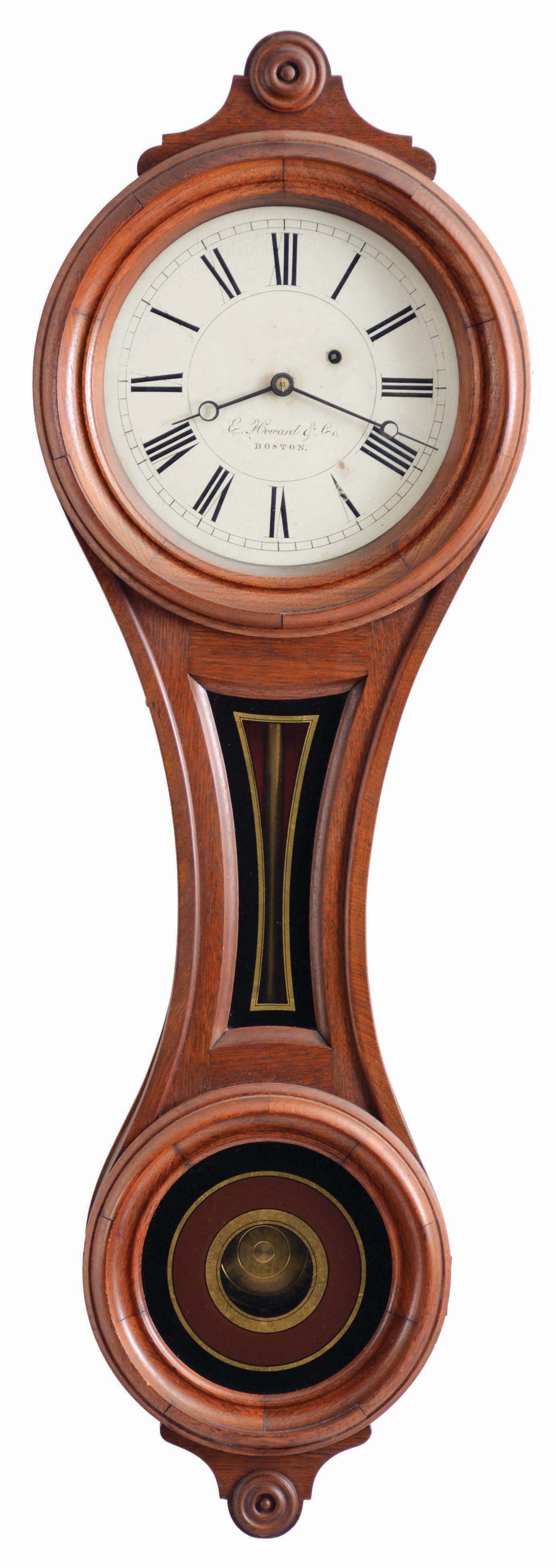 E. Howard & Co., Boston, Mass., "No. 9 Regulator", walnut "figure eight" style case with turned wooden bezel and lower door, reverse painted glasses in black, red, and gold, signed, Roman numeral painted dial with blued steel moon hands, and 8 day, weight driven timepiece movement — Antique Clocks Price Guide