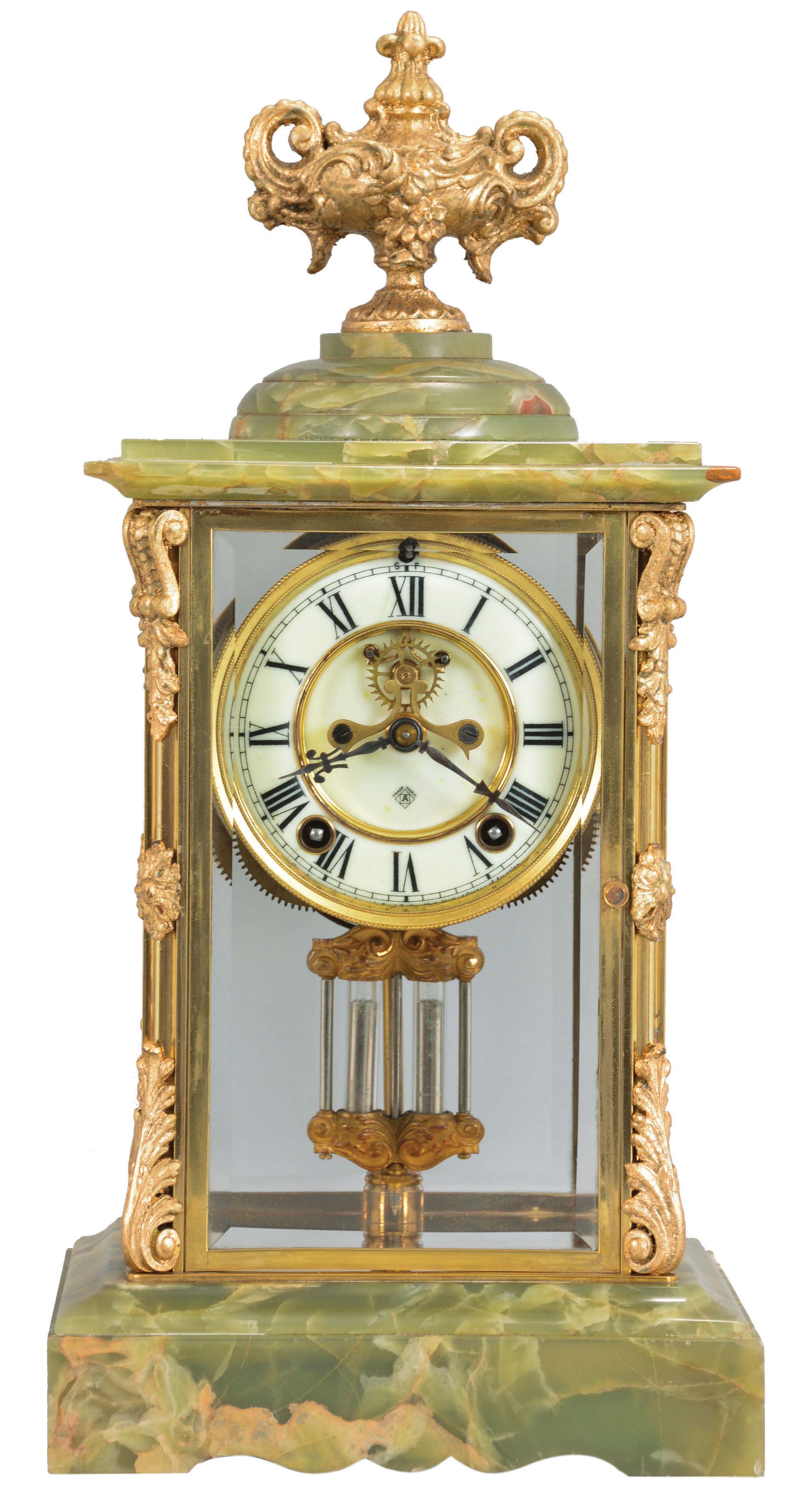 Ansonia Clock Co., New York, "Count", 8 day, time and strike, spring brass movement crystal regulator mantel clock with visible escapement. — Antique Clocks Price Guide