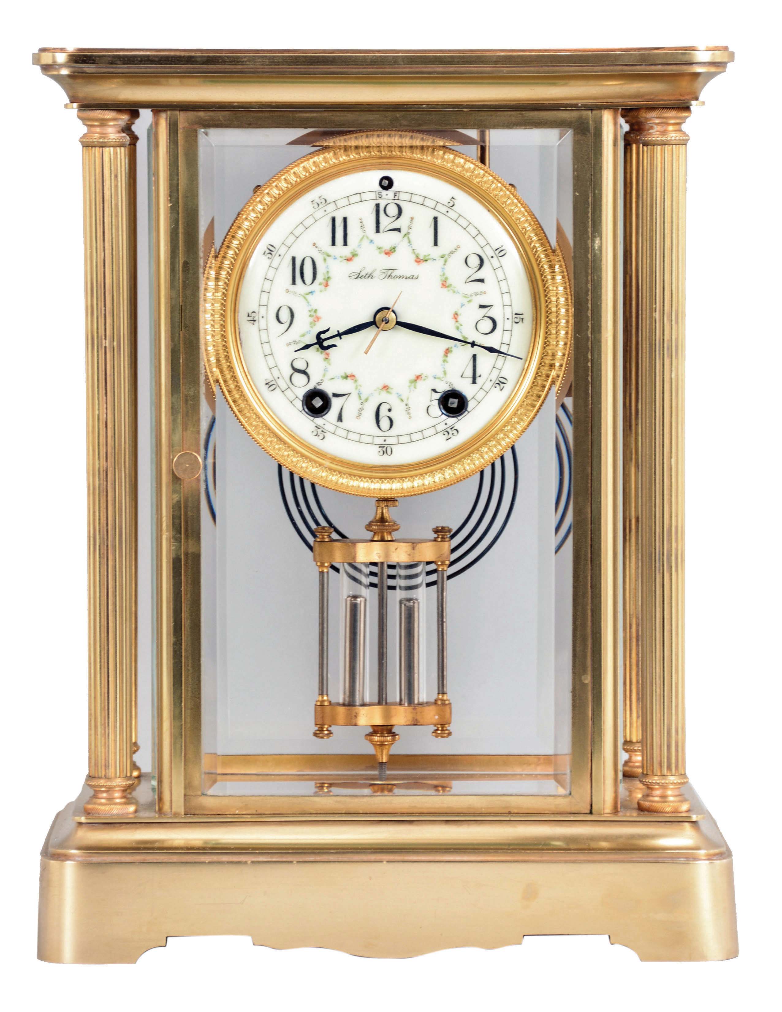 Seth Thomas Clock Co., Thomaston, Conn., "Empire No. 67", 8 day, time and strike, spring brass movement crystal regulator mantel clock. — Antique Clocks Price Guide