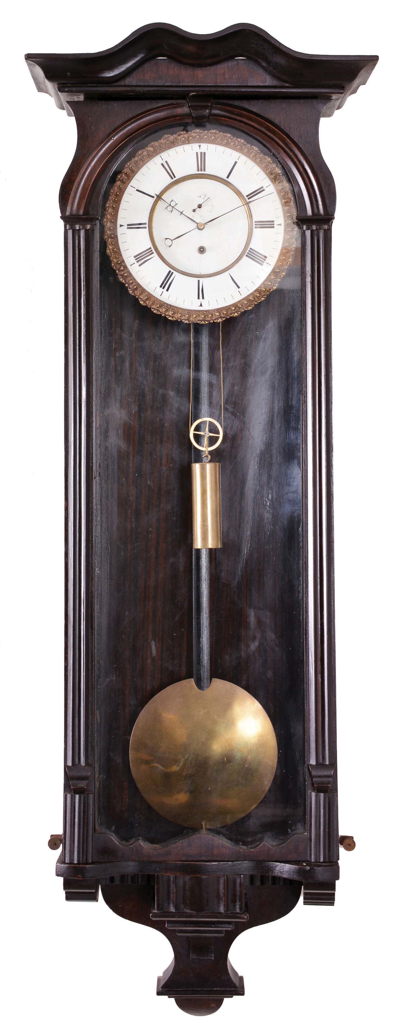 Austria or Germany, Vienna regulator, 8 day, time only, weight-driven movement in a walnut case with serpentine crest, two-piece porcelain dial with pie crust bezel with subsidiary in sunk portion, brass pendulum disc and weight, c.1890 — Antique Clocks Price Guide