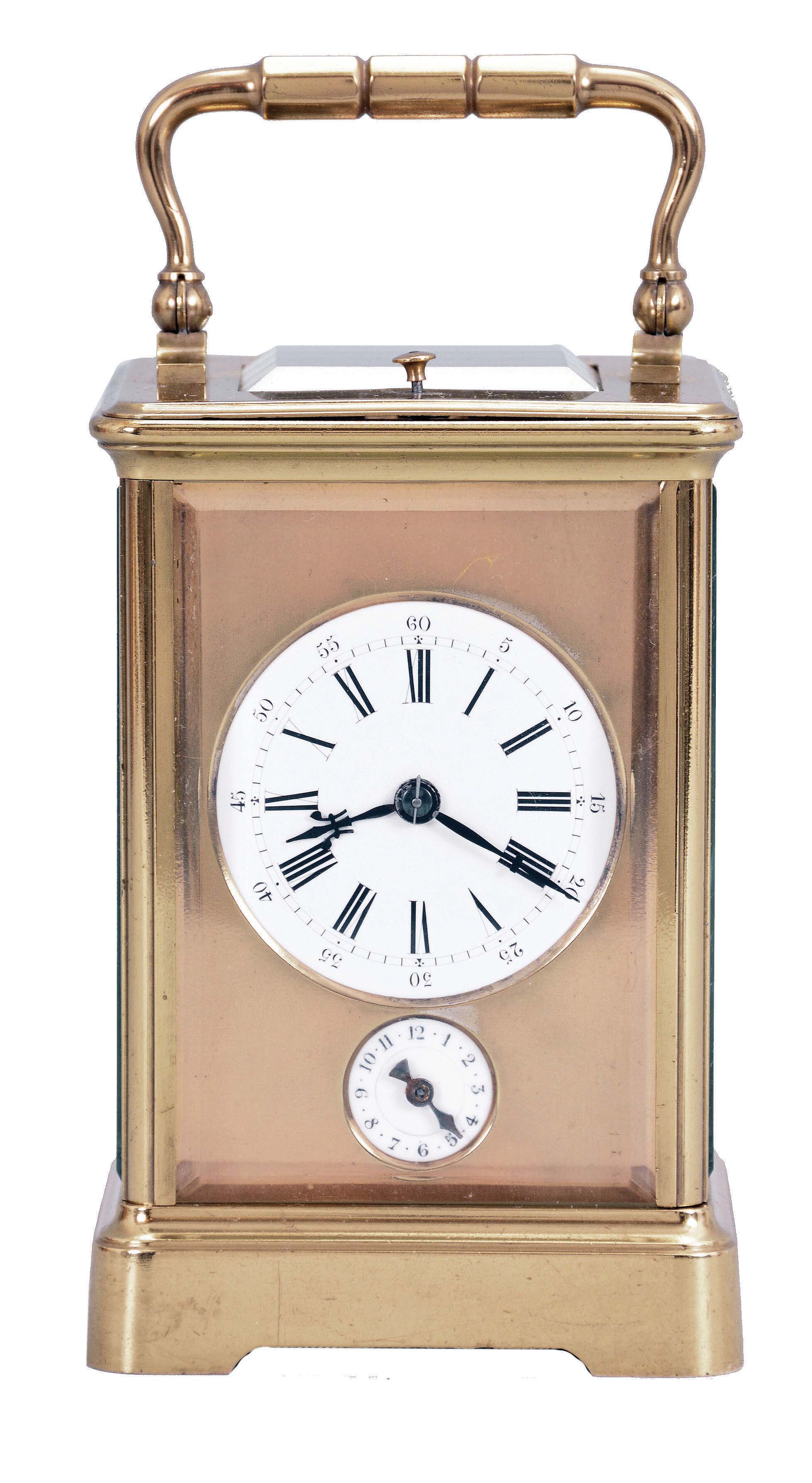 France, a petite sonnerie striking carriage clock with grand sonnerie repeating, polished brass Corniche case with bevelled glasses, the top engraved "J. K. Connally, Oct. 7, 1897", Roman numeral white enamel dial with gilt mask and subsidiary alarm dial, blued steel hands, 8 day, time, strike and alarm movement with lever platform, sounding the quarters in passing, and repeating the last hour and quarter on demand — Antique Clocks Price Guide