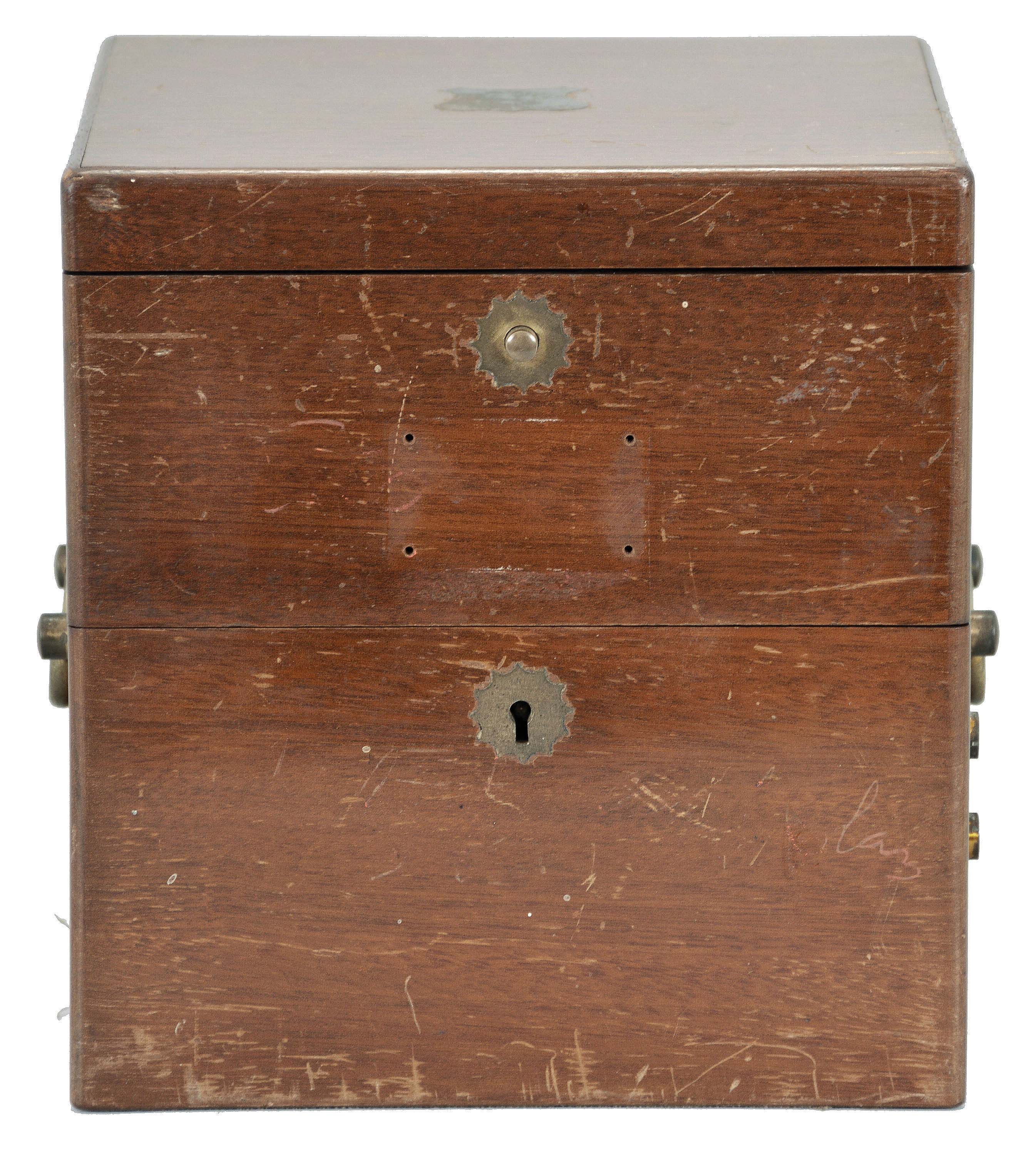 John Bliss & Co., New York, two day marine chronometer, 11 jewel fusee movement with spotted plates, Earnshaw's escapement, freesprung, cut bimetallic balance, diamond endstone, and blued steel helical balance spring, Roman numeral silvered dial with wind indicator and gold spade and poker hands, with gimballed, lacquered brass bowl, and contained in a later, three tier mahogany box with brass furniture, serial #3048 — Antique Clocks Price Guide