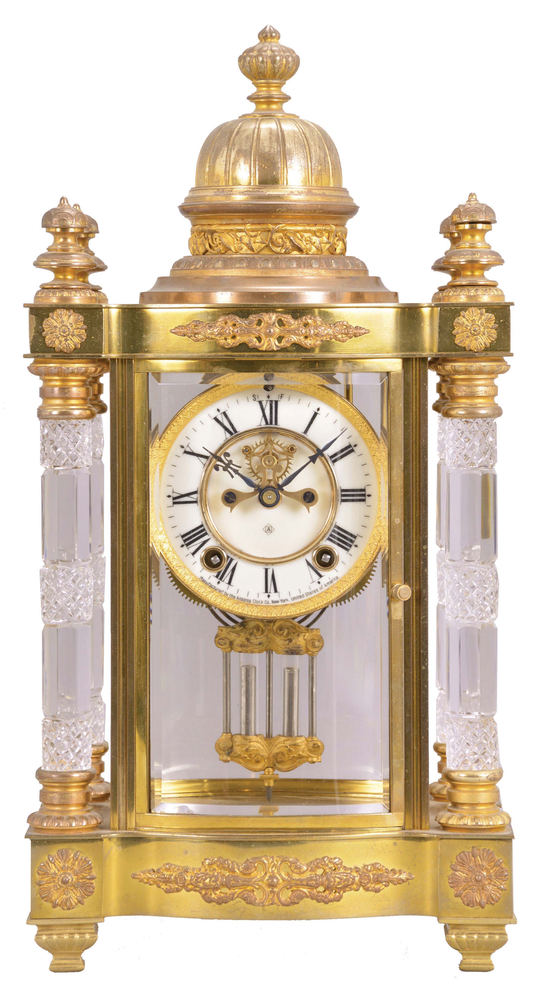 Ansonia Clock Co., New York, "Utopia", 8 day, time and strike, spring driven brass movement crystal regulator mantel clock with visible escapement. — Antique Clocks Price Guide