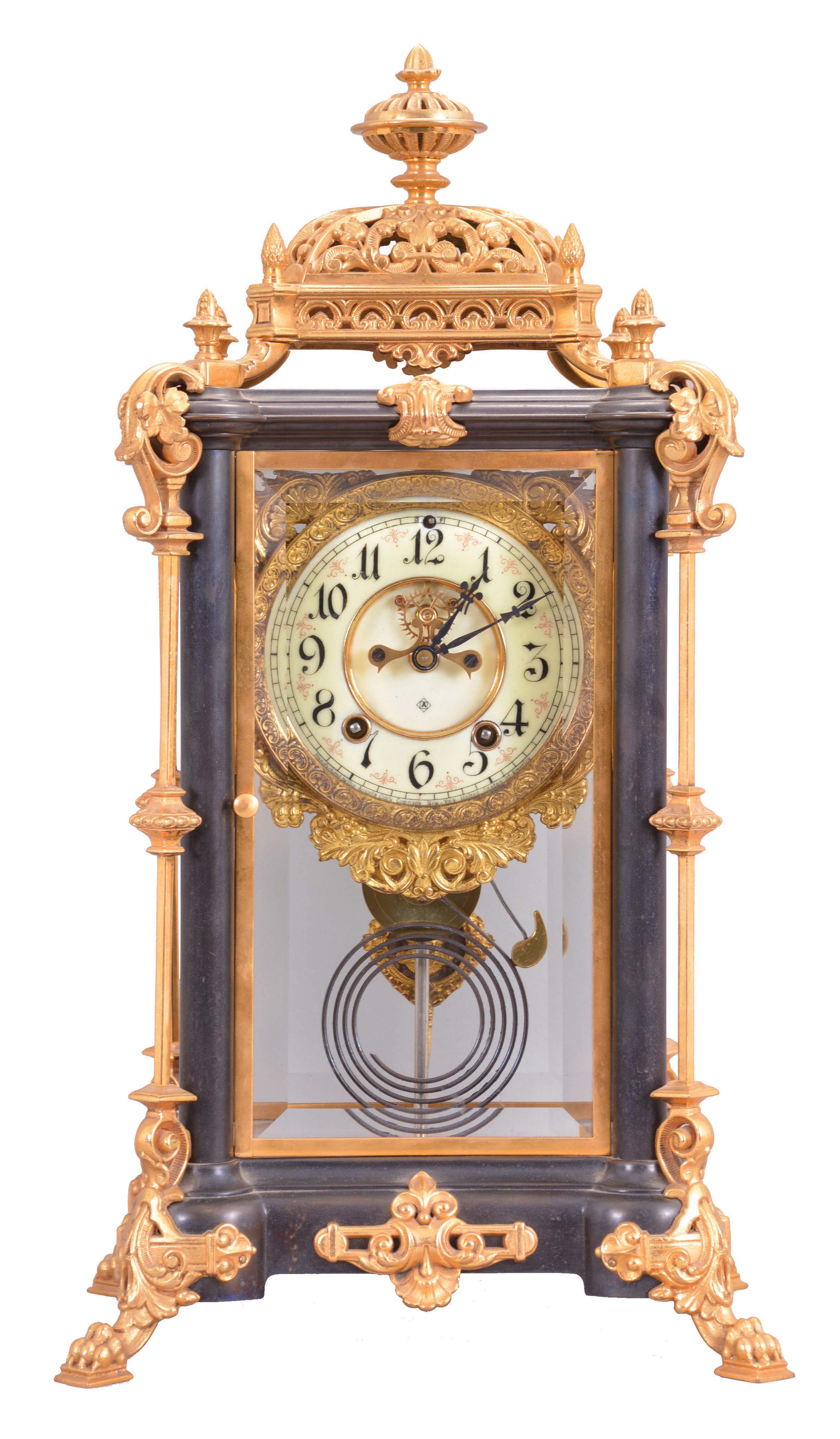 Ansonia Clock Co., New York, "Excelsior", 8 day, time and strike, spring driven brass movement crystal regulator mantel clock with a visible escapement. — Antique Clocks Price Guide