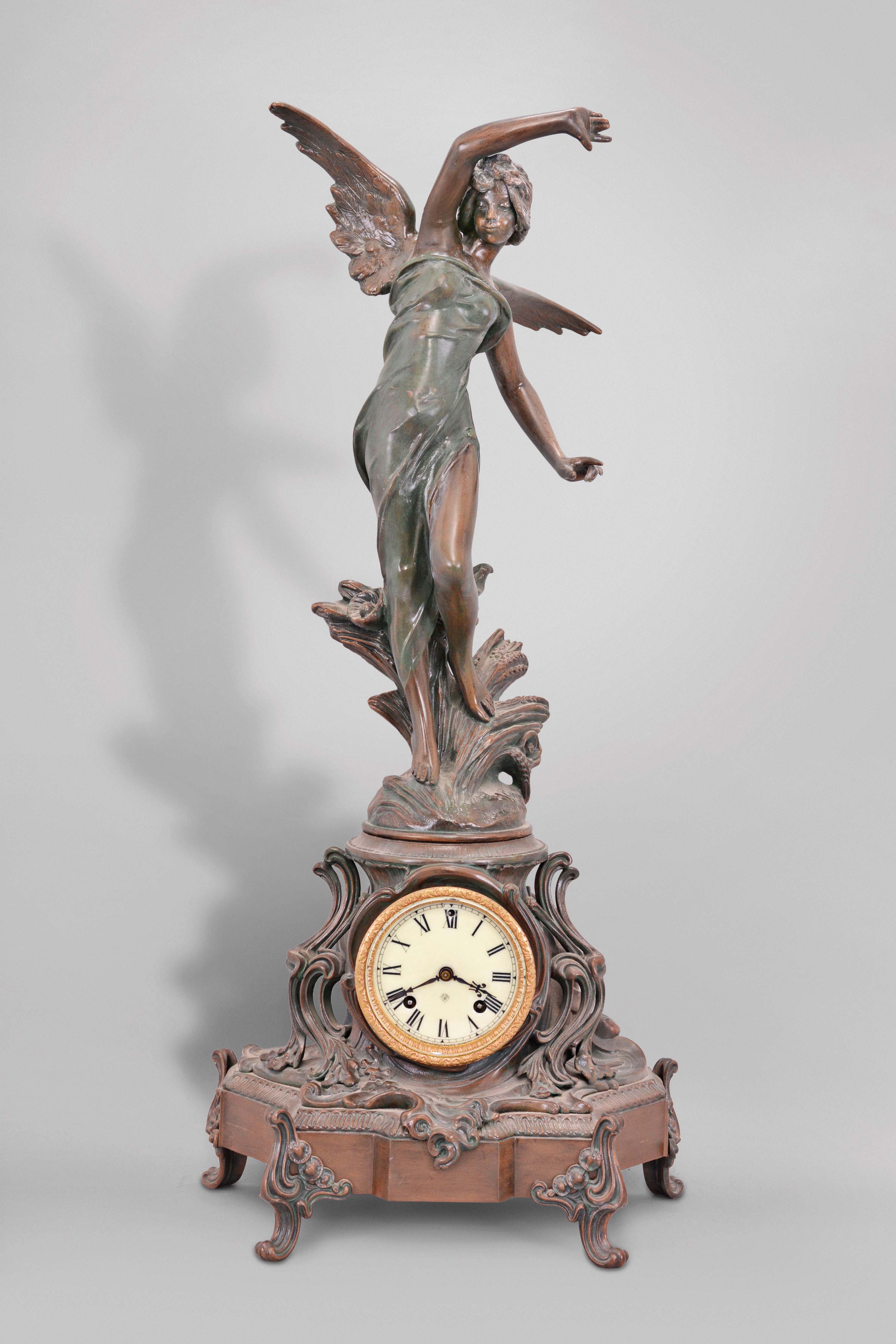 Ansonia Clock Co., New York, "Oceanic (base) and LaSource (figure) " shelf clock with a spring driven, 8 day, time and half hour strike movement in a bronze finished spelter case.. — Antique Clocks Price Guide