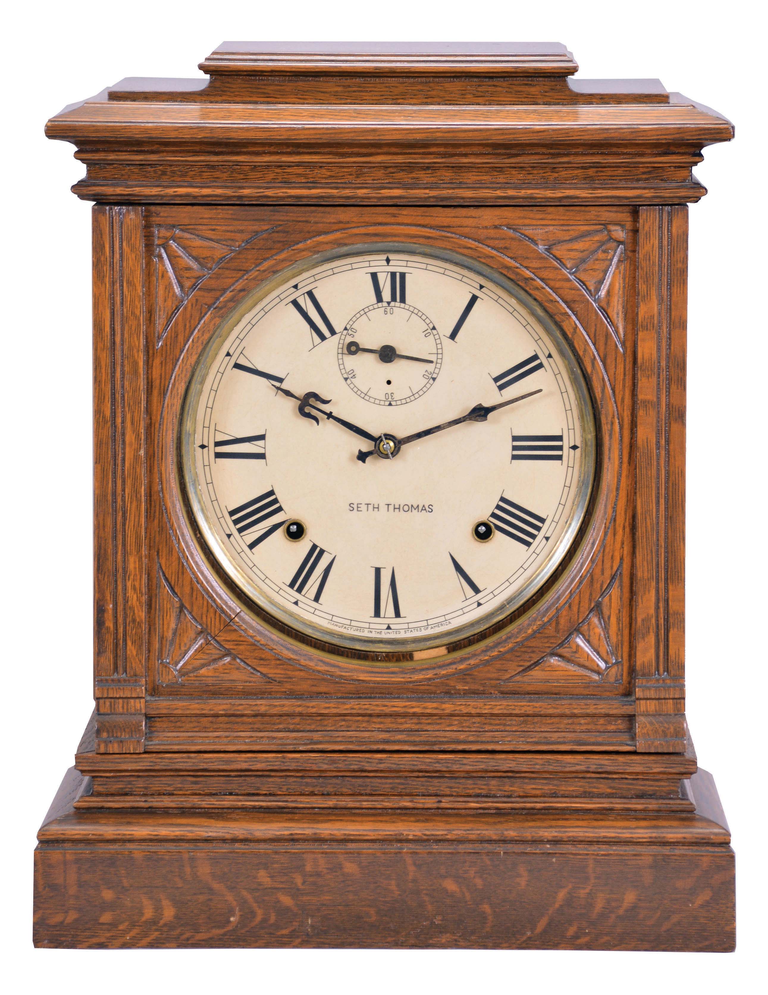 Seth Thomas Clock Co., Thomaston, Conn., "Hotel" shelf clock with a spring driven, 8 day, time and strike movement with cathedral gong in an old oak case. — Antique Clocks Price Guide