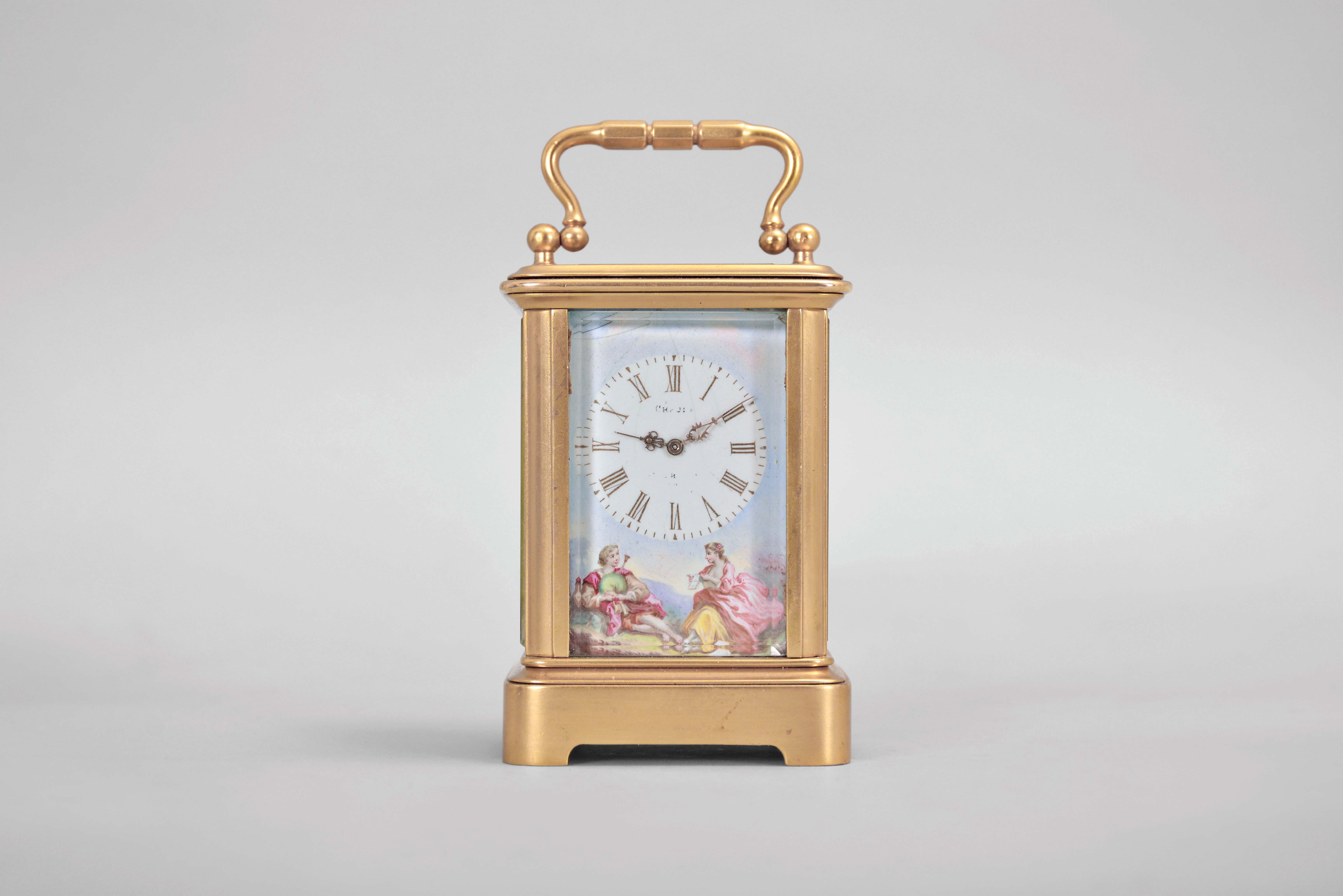 France, a mignonette No.1 carriage clock, glazed, gilt Corniche case, roman numeral, polychrome enamel dial depicting a young couple in a landscape, fancy gilt hands, 8 day, timepiece movement with lever platform, the back plate marked "A.B. Depose", and inside of front plate with letter B within a circle — Antique Clocks Price Guide