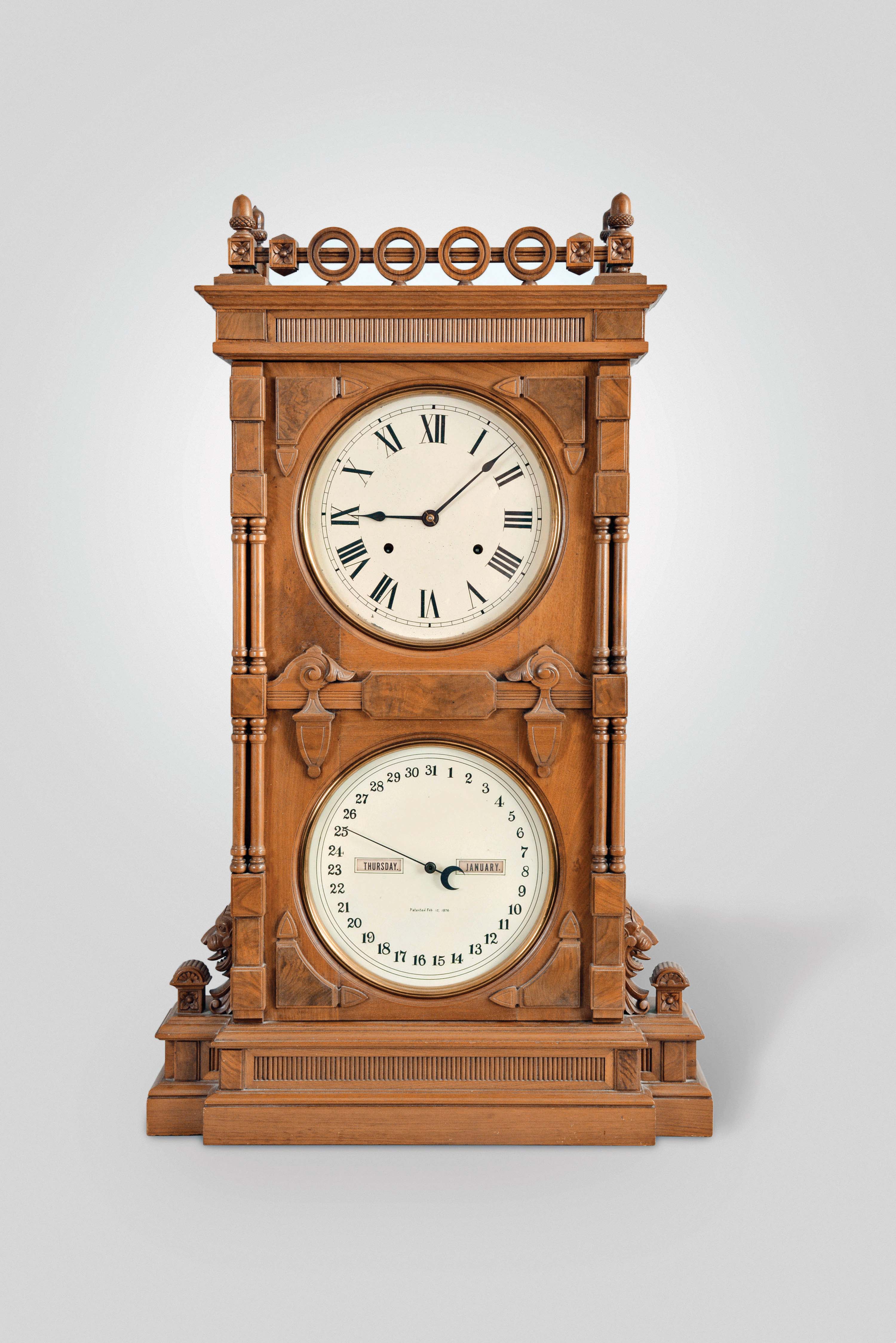 Seth Thomas Clock Co., Thomaston, Conn., "Parlor Calendar No. 10" shelf clock, 8 day, time, cathedral gong strike and perpetual calendar, weight driven movement in an ornately carved walnut case with painted metal dials — Antique Clocks Price Guide