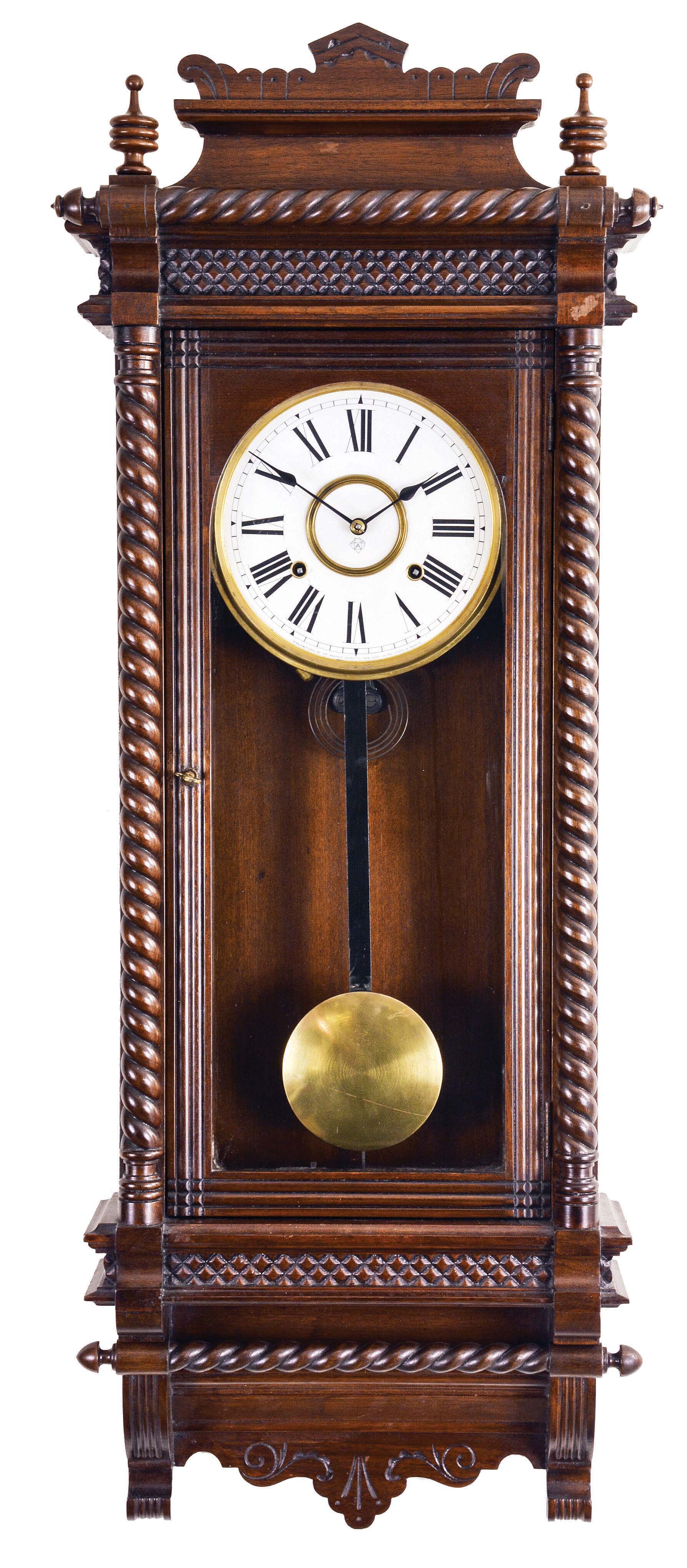 Ansonia Clock Co., New York, "Queen Charlotte" hanging clock with a spring driven, 8 day, time and half hour strike movement in a walnut case. — Antique Clocks Price Guide