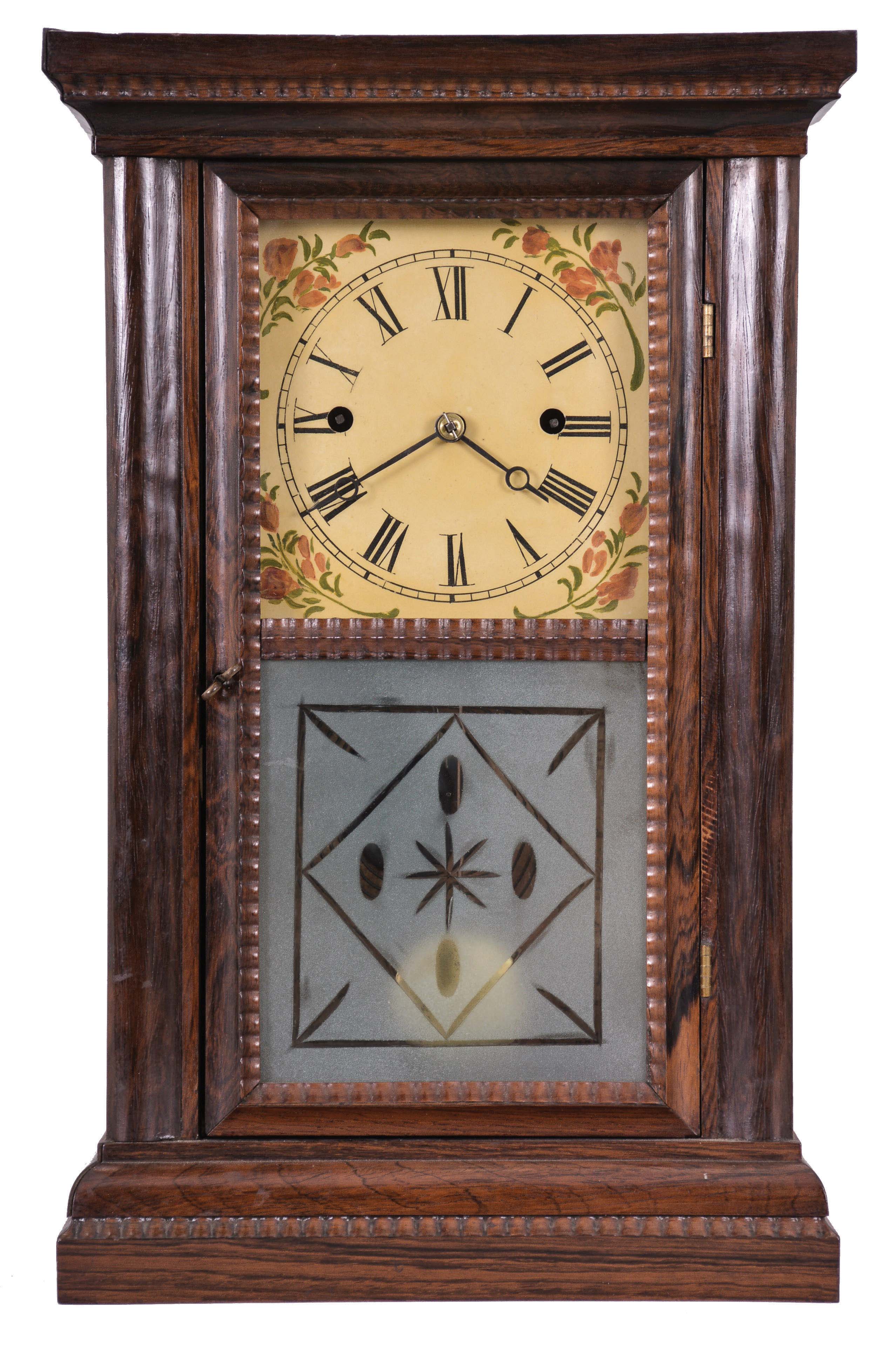 Forestville Mfg. Co., (J.C. Brown), Bristol, Conn., 8 day, time and strike, spring fusee brass movement small cornice top shelf clock with rippled molding on the door. — Antique Clocks Price Guide