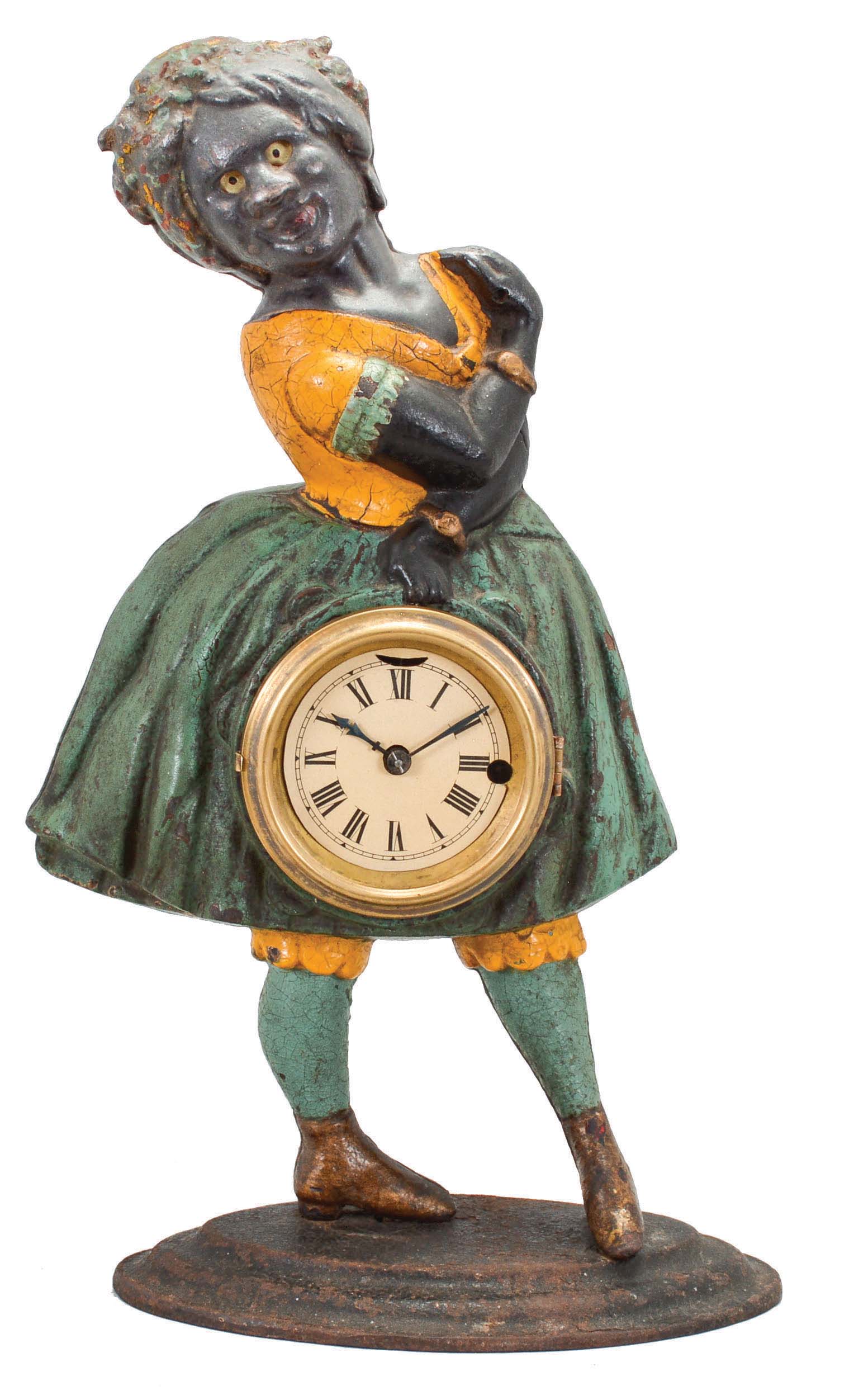 Bradley & Hubbard, Meriden, Conn., "Topsey" blinking eye shelf clock with a spring driven, 30 hour, timepiece with a balance wheel escapement in a painted cast iron case. — Antique Clocks Price Guide