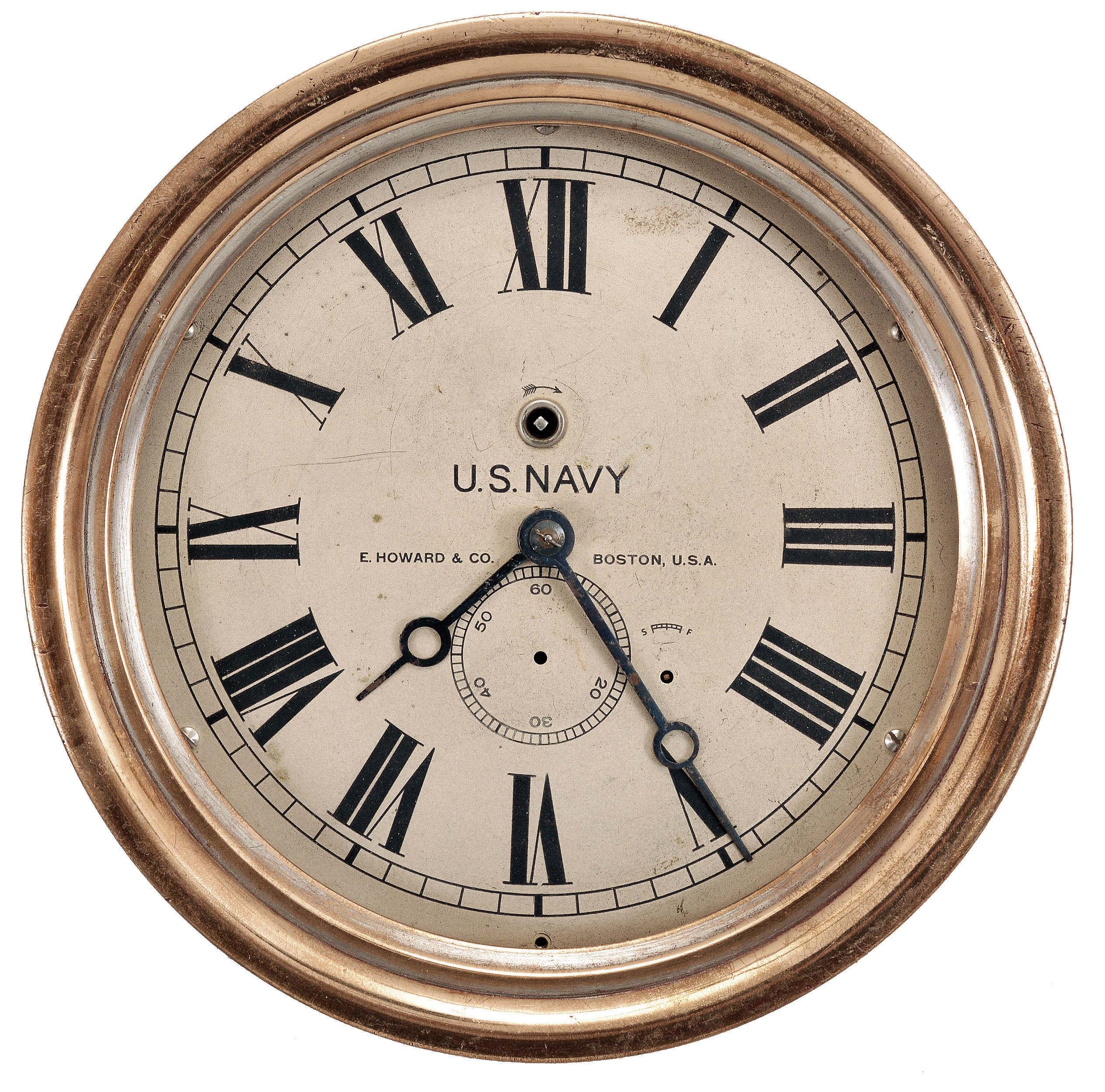 E. Howard & Co., Boston, Mass., marine lever, 8 day, time only, spring-driven 11 jewel lever escapement movement in a heavy brass case, 8 inch silvered dial imprinted with the maker's name and "U.S. Navy", subsidiary seconds below the center arbor with adjacent rating arbor to its right, blued steel hands, movement serial number 0015. — Antique Clocks Price Guide