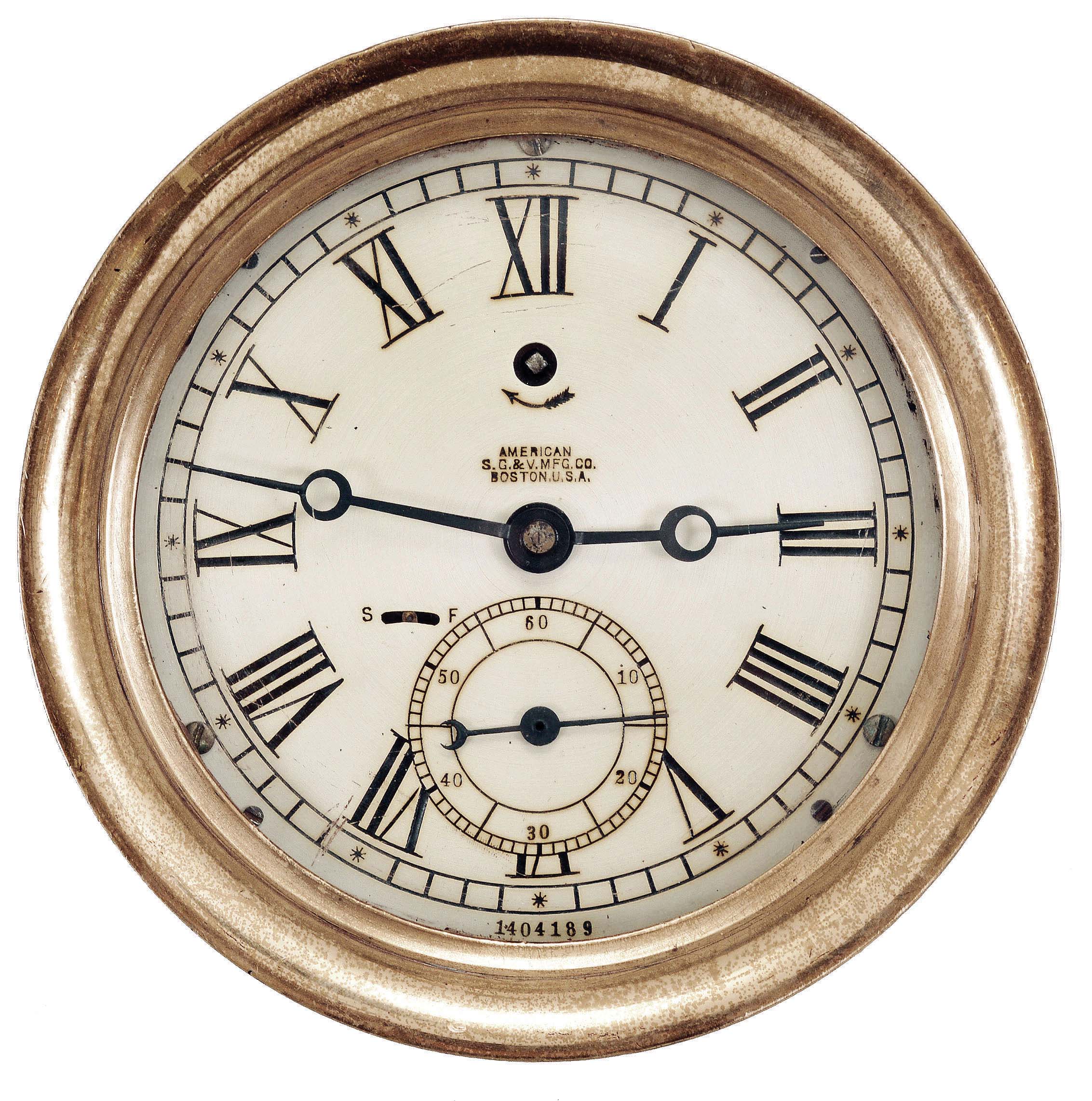 Chelsea Clock Co., Boston, Mass., for American Steam Gauge & Valve Mfg. Co., Boston, engine room timepiece, 8 day, time only, spring-driven jeweled balance wheel movement in a brass case with screw-on bezel, 6 inch silvered dial inscribed with "American S.G. & V. MFG. CO. / BOSTON U.S.A.", large subsidiary seconds below the center arbor, and blued steel hands. — Antique Clocks Price Guide
