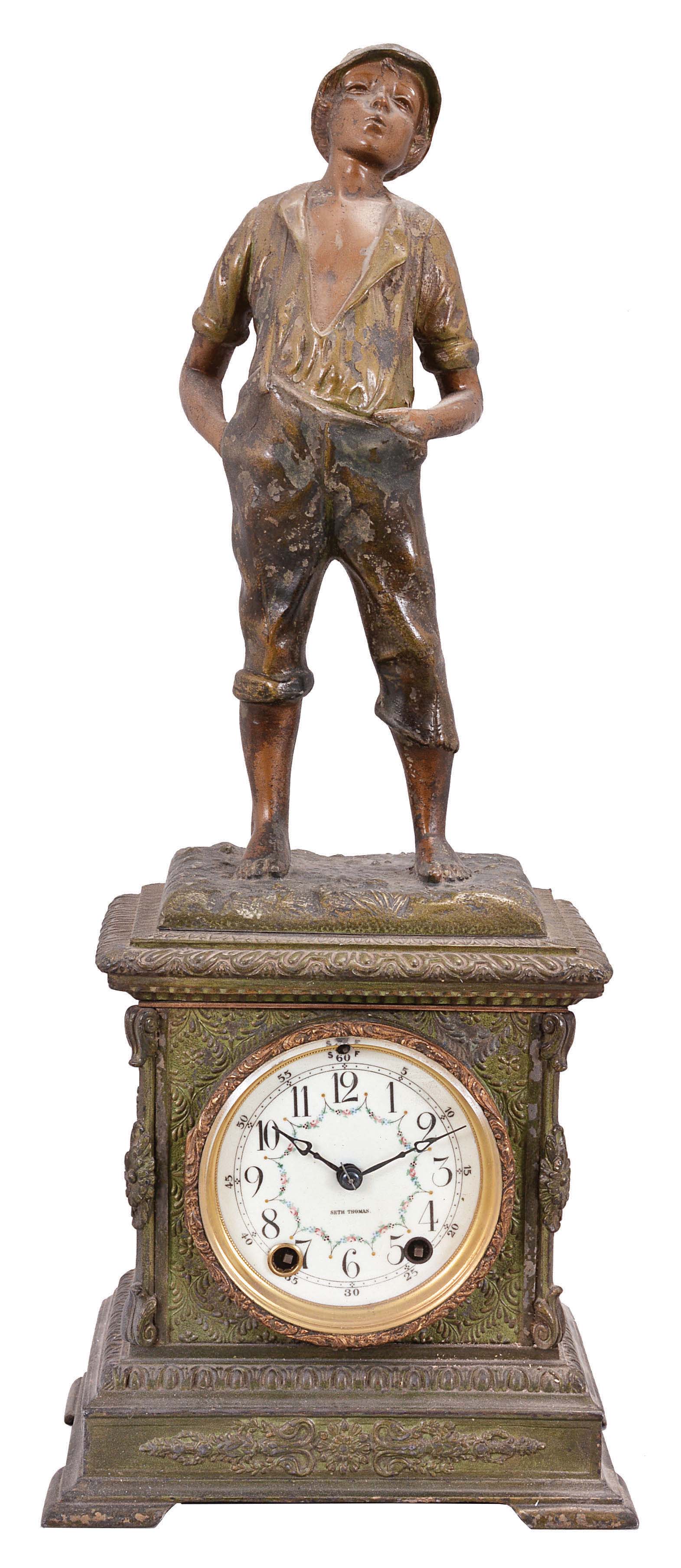 Seth Thomas Clock Co., Thomaston, Conn., "Whistling Boy" statue shelf clock with a spring driven, 8 day, time and half hour strike movement in a spelter case with a Syrian bronze finish. — Antique Clocks Price Guide
