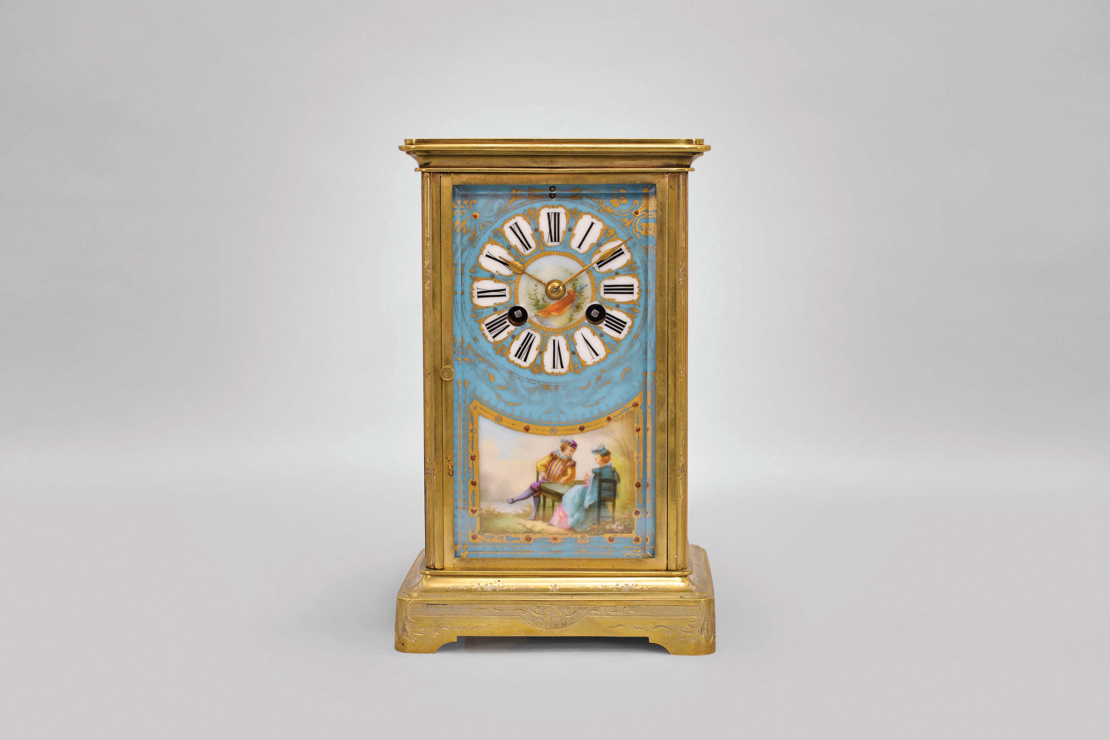 France, table or mantel regulator with polychrome enamel panels, the engraved, crystal regulator style case with sides and dial featuring men and women in gardens and landscapes, wearing fanciful Elizabethan costume, the panels bordered in blue, and dial with blue ground, and having Roman numerals within gilt bordered cartouches, gilt spade hands, 8 day, two train pendule de Paris movement, striking the hours and half hour in passing — Antique Clocks Price Guide