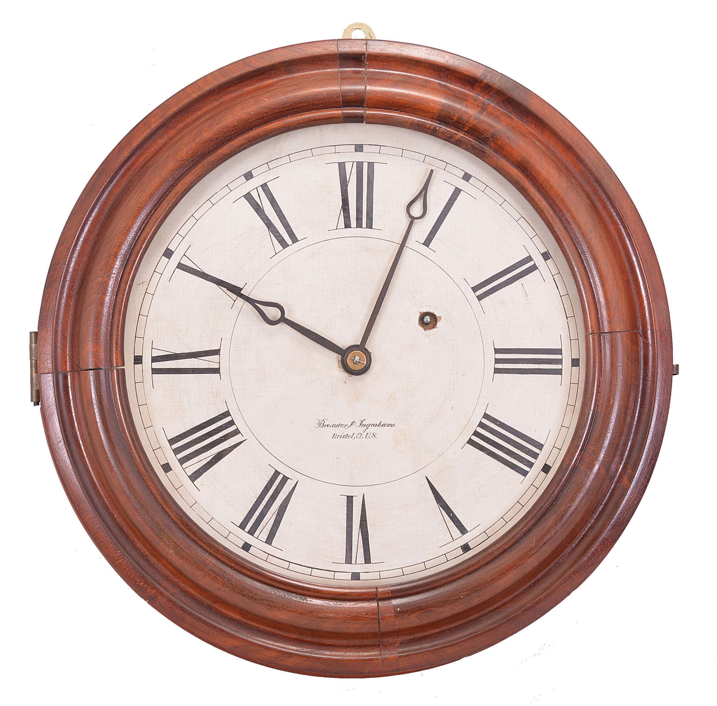 Brewster & Ingrahams, Bristol, Conn., Gallery hanging clock with an 8-day spring driven East-West timepiece movement with a brass spring in a crotch mahogany case. — Antique Clocks Price Guide