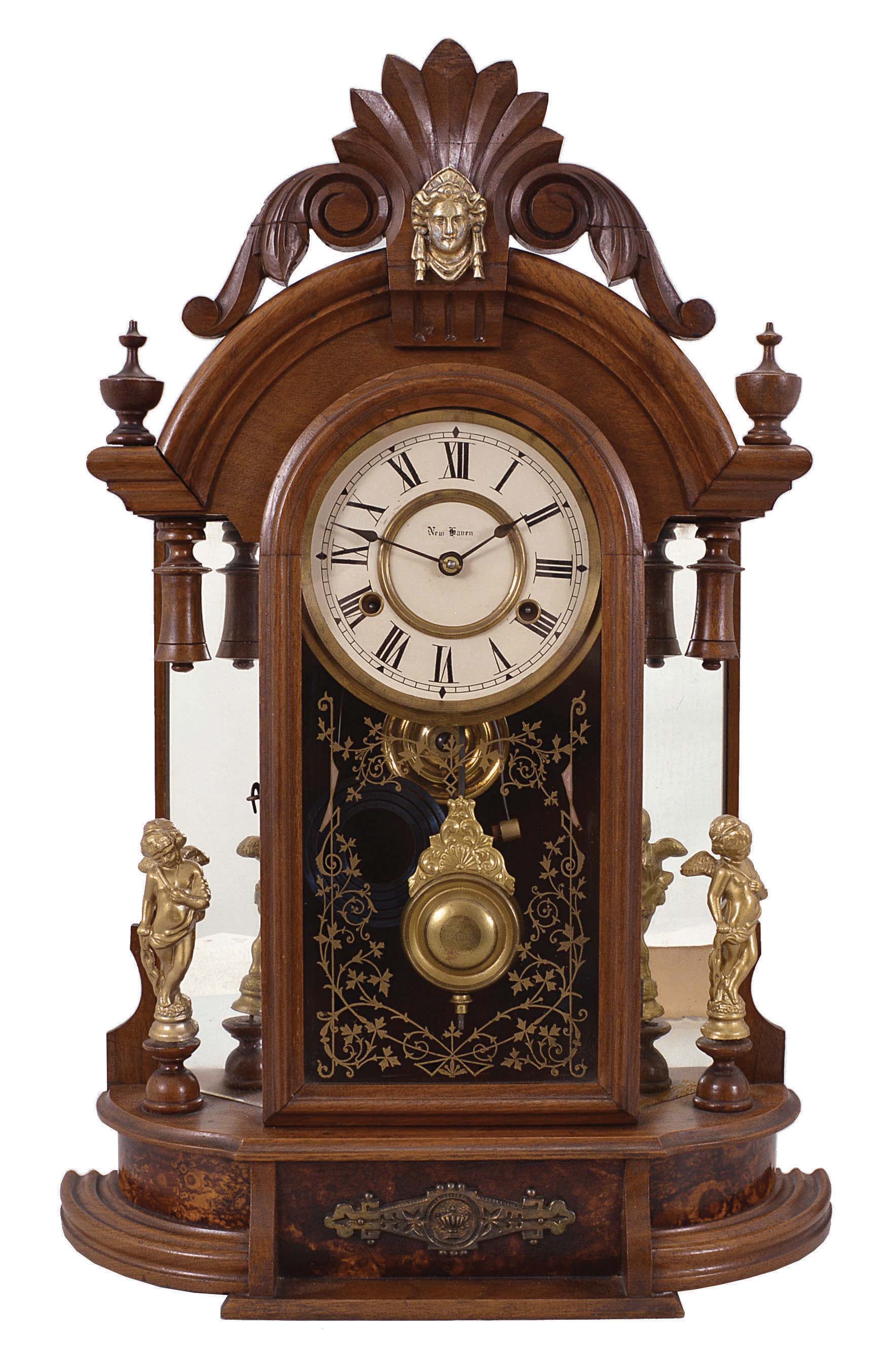 New Haven Clock Co., New Haven, Conn., "Occidental", 8 day, time and strike, spring brass movement mirror side mantel clock. — Antique Clocks Price Guide