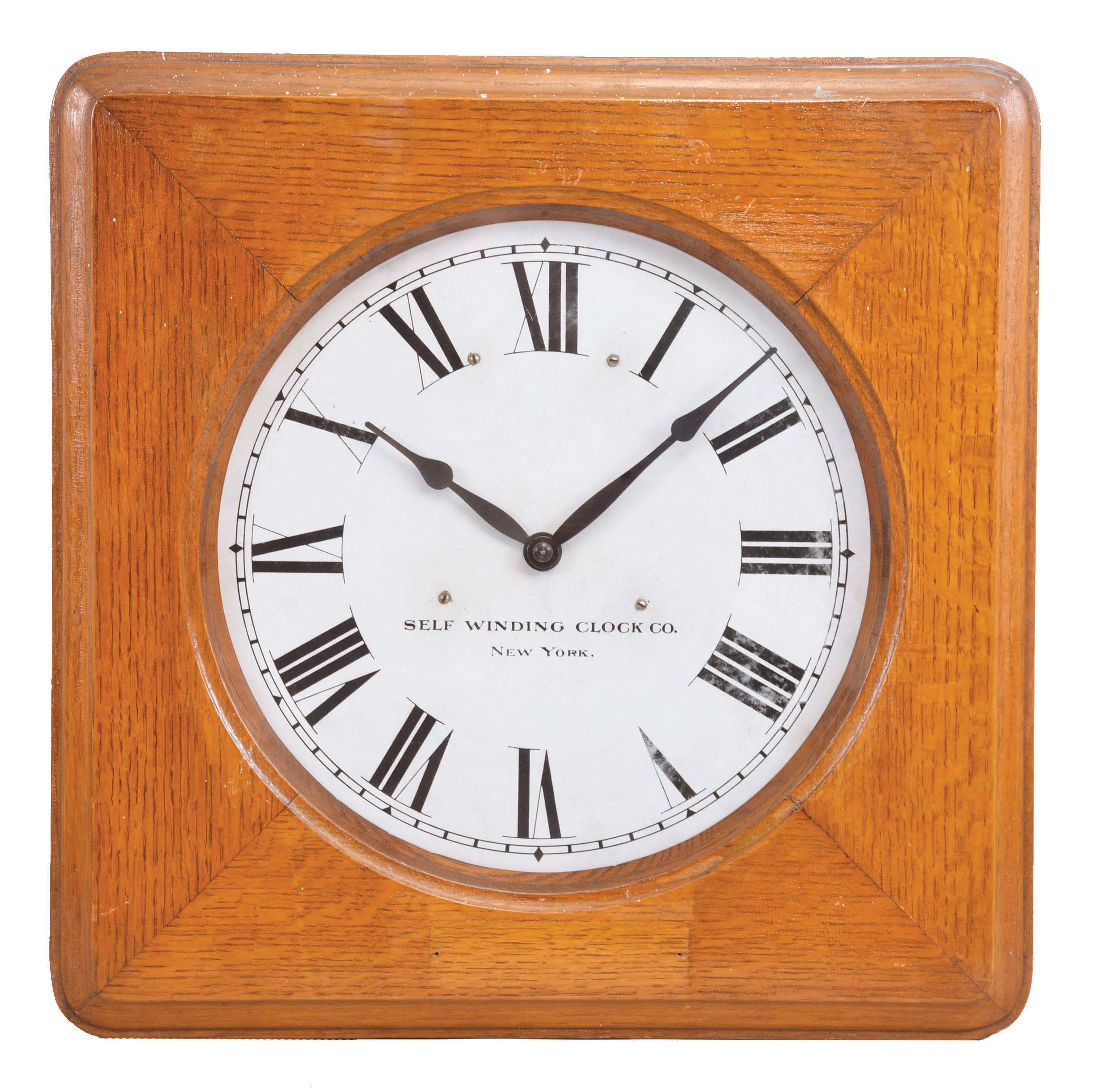 Self Winding Clock Co., New York, unidentified model master timepiece with a "Style F Self Winding Synchronized Movement" in a solid oak case. — Antique Clocks Price Guide