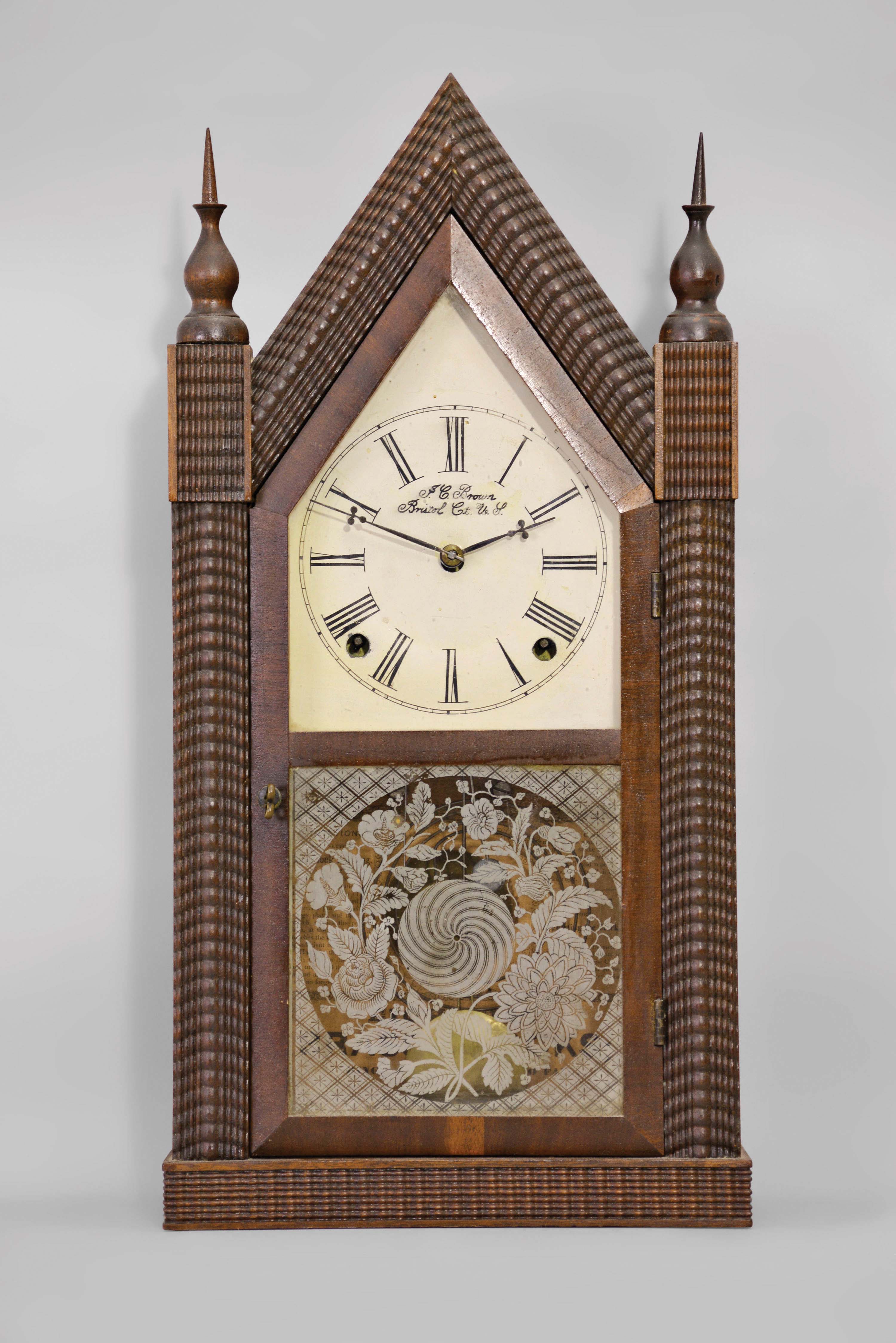 Forestville Mfg. Co., (J.C. Brown), Bristol, Conn., 8 day, time and strike, spring brass movement ripple-front sharp gothic or steeple clock. — Antique Clocks Price Guide