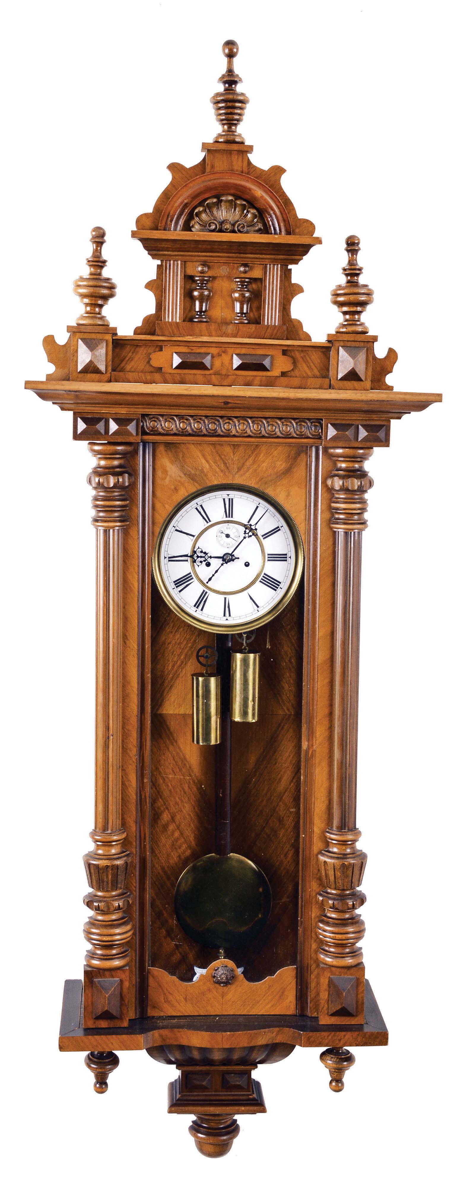 Clocks- 2 (Two) Vienna wall clocks, 8 day, time and strike, brass weight driven movement in walnut case with white enamel dial, unsigned: (1) Has embossed weights, dial center and pendulum disc; (2) Subsidiary seconds — Antique Clocks Price Guide