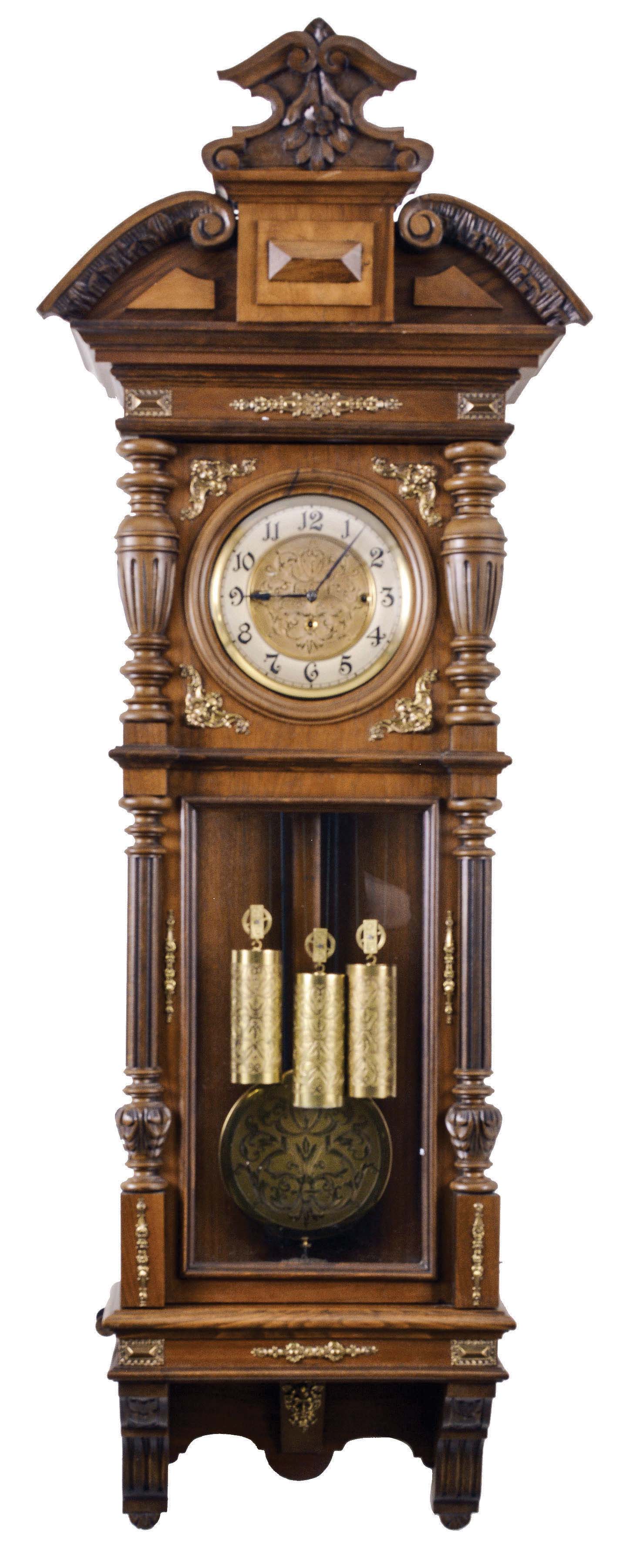 Germany, Vienna regulator wall clock, 8 day, time, strike and grand sonnerie, weight driven movement in a walnut case with brass ornamentation, silvered chapter ring, matching engraved dial center, weights and pendulum disc — Antique Clocks Price Guide