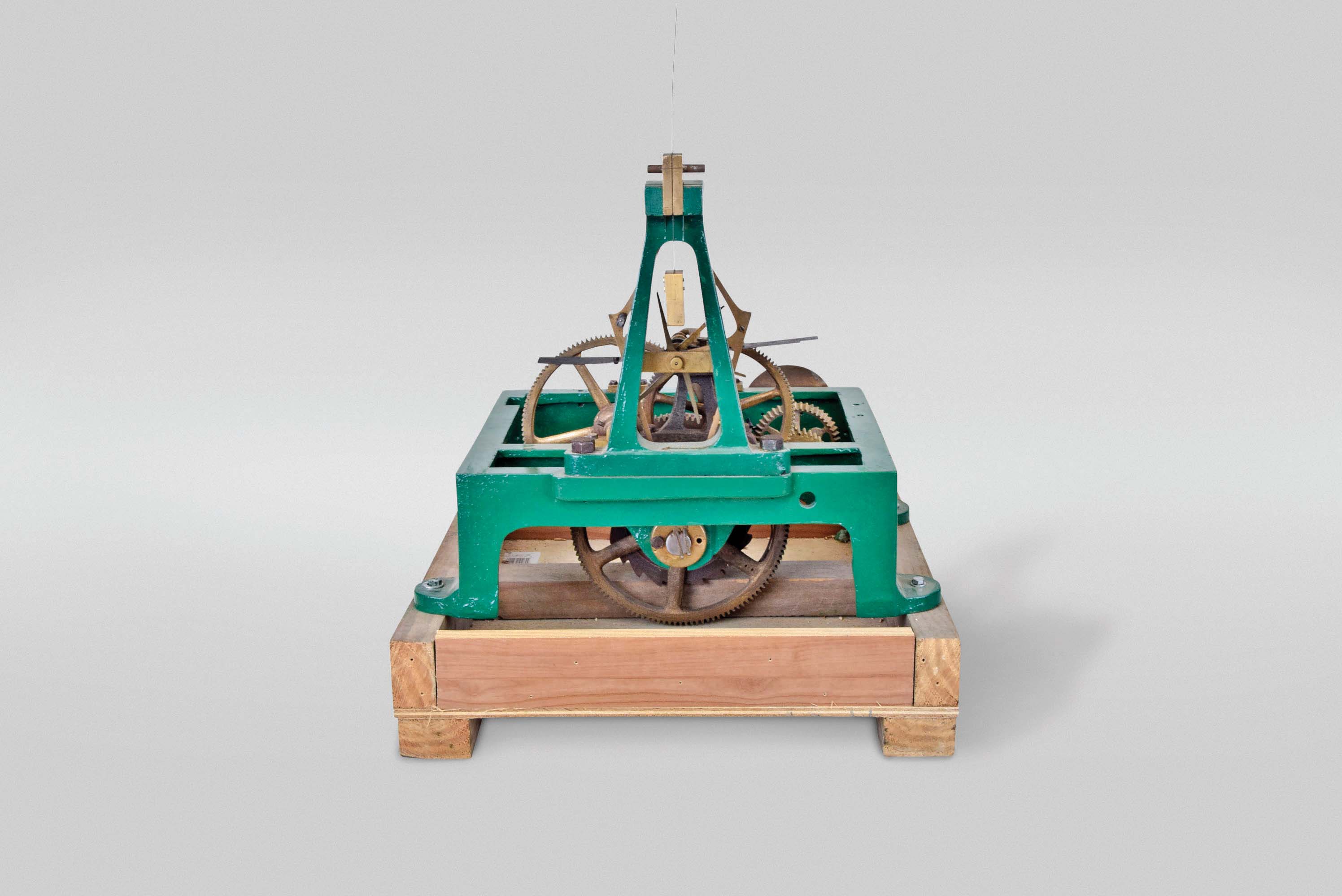 Europe, tower clock, time only, weight driven movement with double three legged gravity escapement in a green painted cast iron frame, mounted on wooden cradle. — Antique Clocks Price Guide