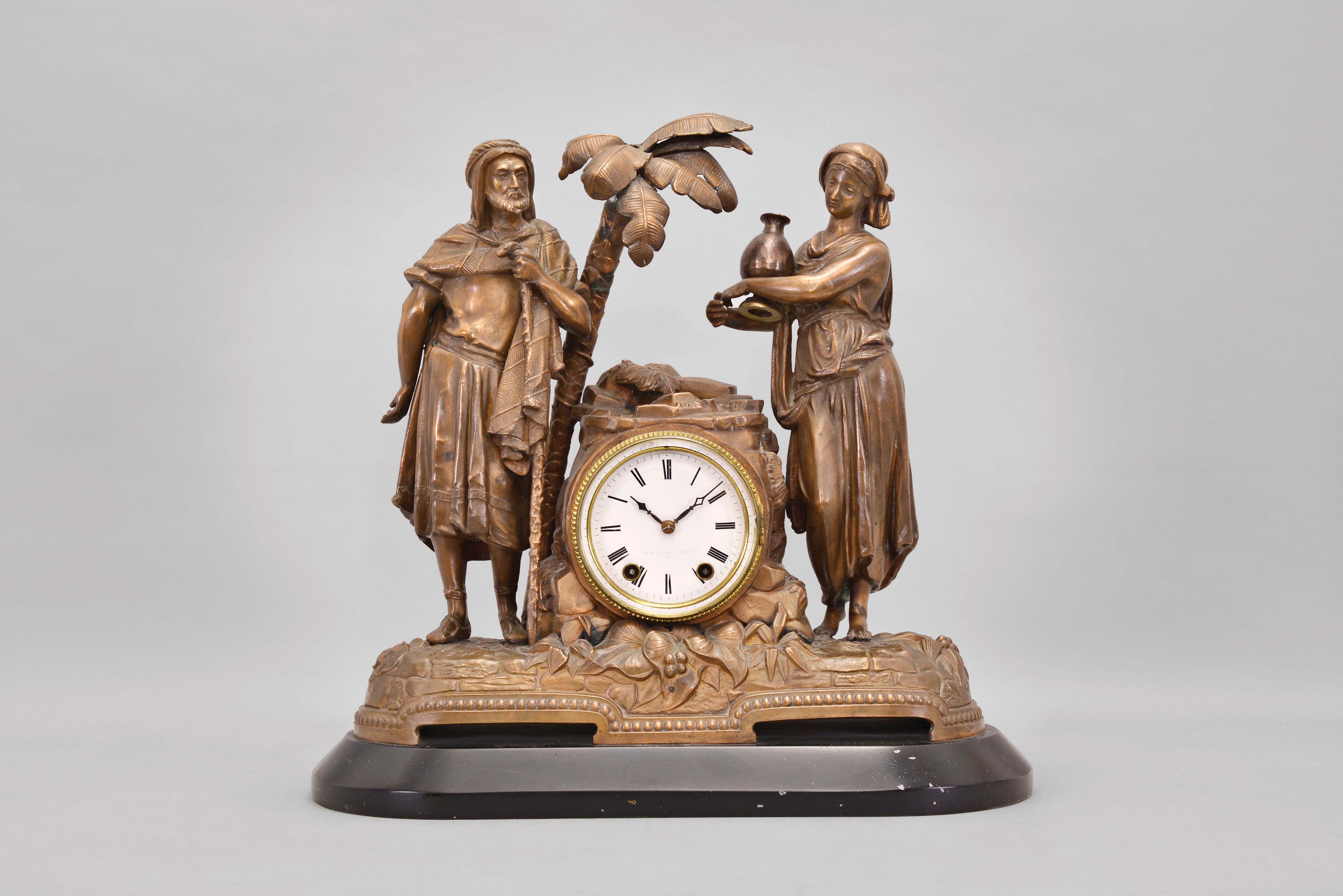 Seth Thomas Sons & Co., New York, "8003" (Rebecca at the Well), shelf clock with a spring driven 15 day time and half hour strike movement in a bronzed finish spelter case. — Antique Clocks Price Guide