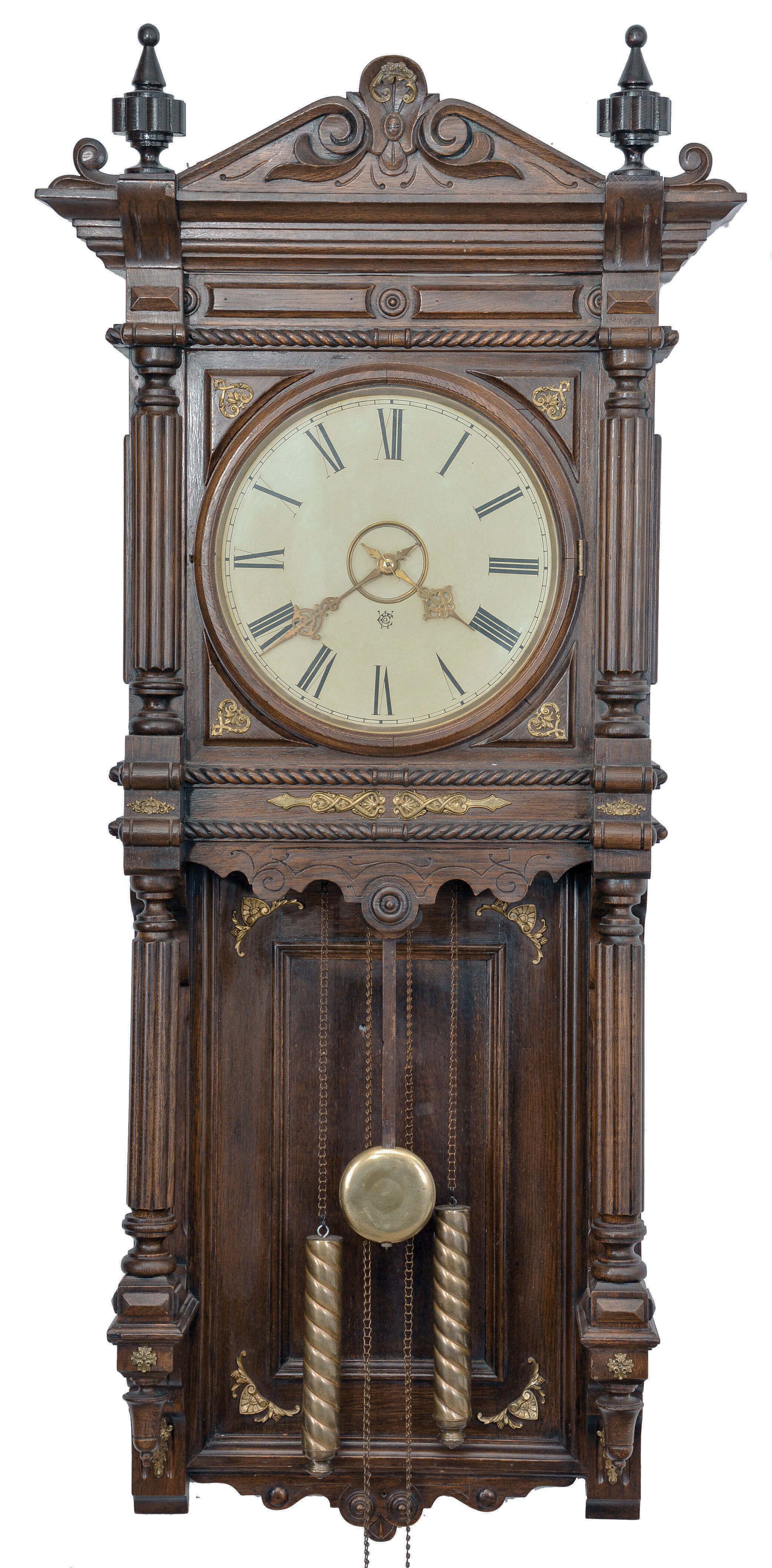 Waterbury Clock Co., Waterbury, Conn., "Atlanta", 8 day, time and strike, weight driven brass movement free swinging wall clock. — Antique Clocks Price Guide