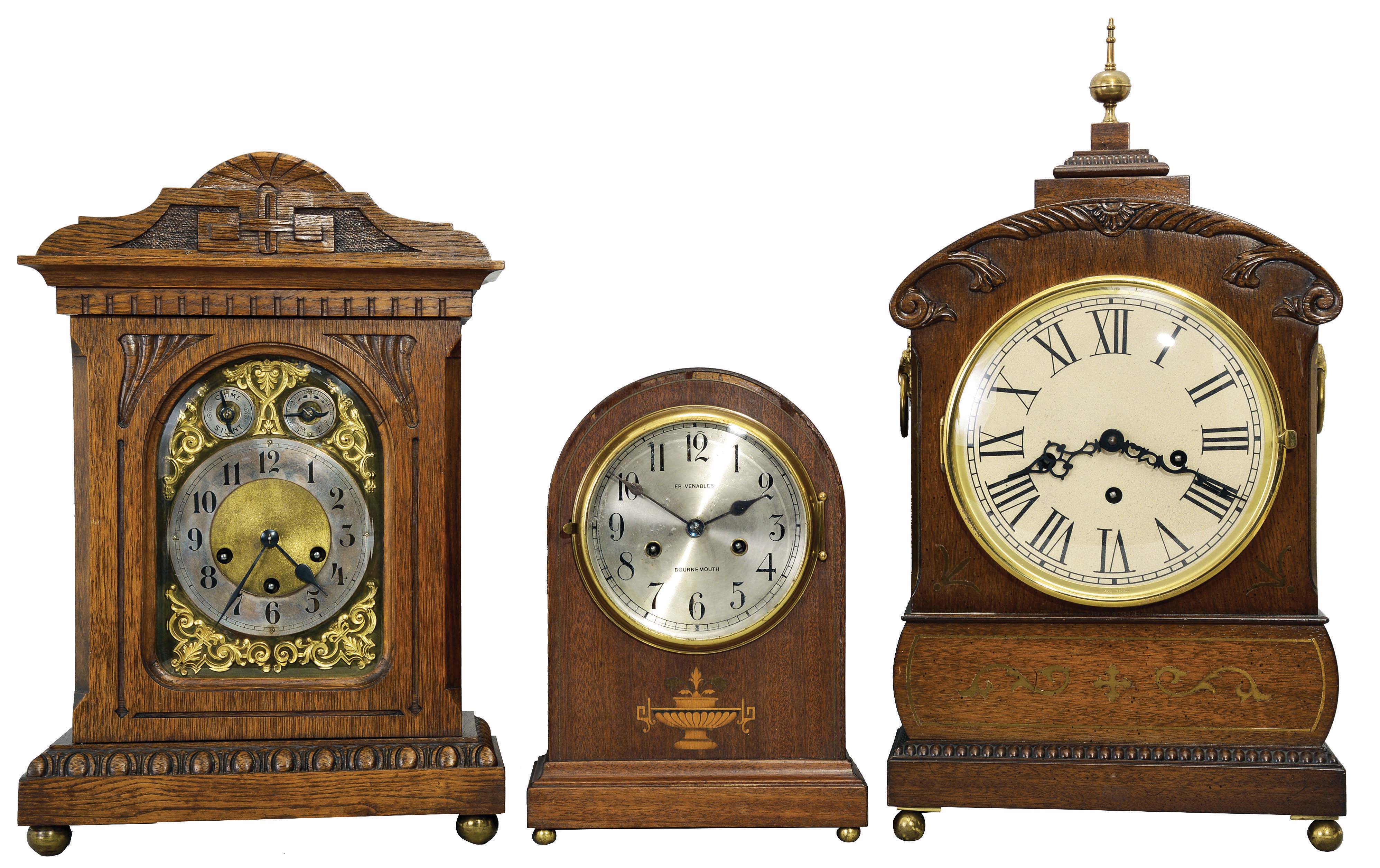 Clocks- 3 (Three): (1) Germany, Junghans, 8 day, time, strike and Westminster chime spring brass movement bracket clock, c1900 (2) Germany, Jauch, 8 day, time, strike and Westminster chime spring brass movement bracket clock, c1975 (3) Germany, Silesia, 8 day, time and strike, spring brass movement round top mantel clock, c1930 — Antique Clocks Price Guide
