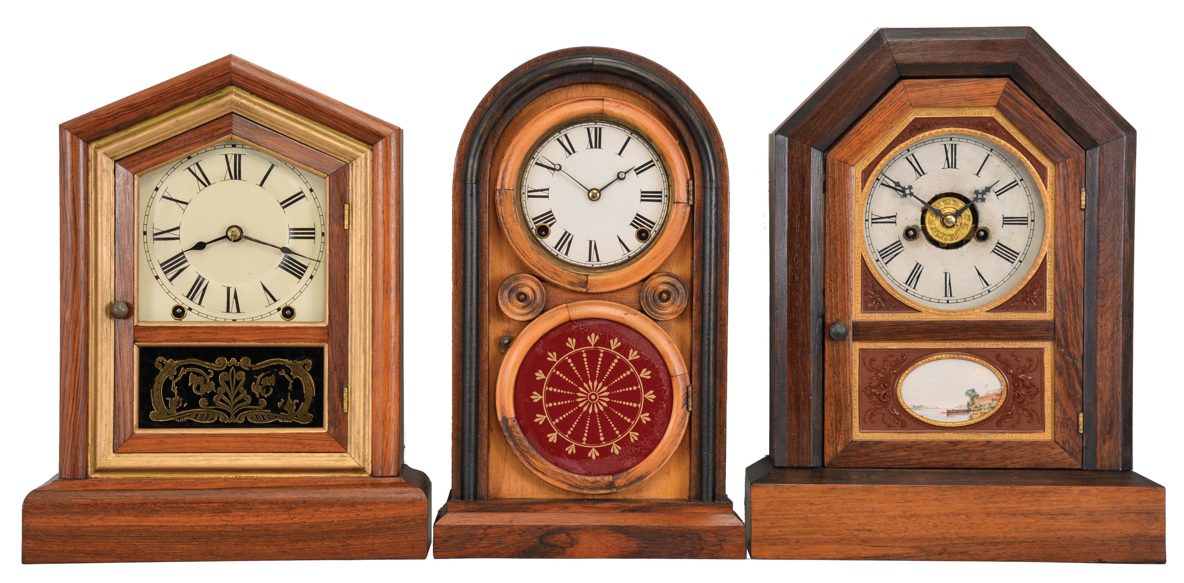 Clocks- 6 (Six): (1) Seth Thomas Clock Co., Thomaston, Conn., "Victoria" shelf clock with a spring driven, 8 day, time and strike movement in a rosewood veneered case, c1880. (2) Seth Thomas Clock Co., Thomaston, Conn., "Kitchen" shelf clock with a spring driven, 30 hour, time and strike movement in a mahogany veneered case, c1875. (3) Ingraham Clock Co., Bristol, Conn., "Venetian No. 3" shelf clock with spring driven, 8 day, time and strike movement in a mahogany veneered case, c1875. (4) Jerome & Co., New Haven, Conn., shelf clock with a spring driven, 30 hour, time, strike and alarm movement in a rosewood veneered case with decorative gutta percha tablet, c1875. (5) E. N. Welch Mfg. Co., Forestville, Conn., "Thursby" shelf clock with a spring driven, 30 hour, time and strike movement in a walnut case, c1890. (6) Seth Thomas Clock Co., Thomaston, Conn., "Giant, No. 2" shelf clock with a spring driven, 8 day, time, strike and alarm movement in an oak case, c1904. — Antique Clocks Price Guide
