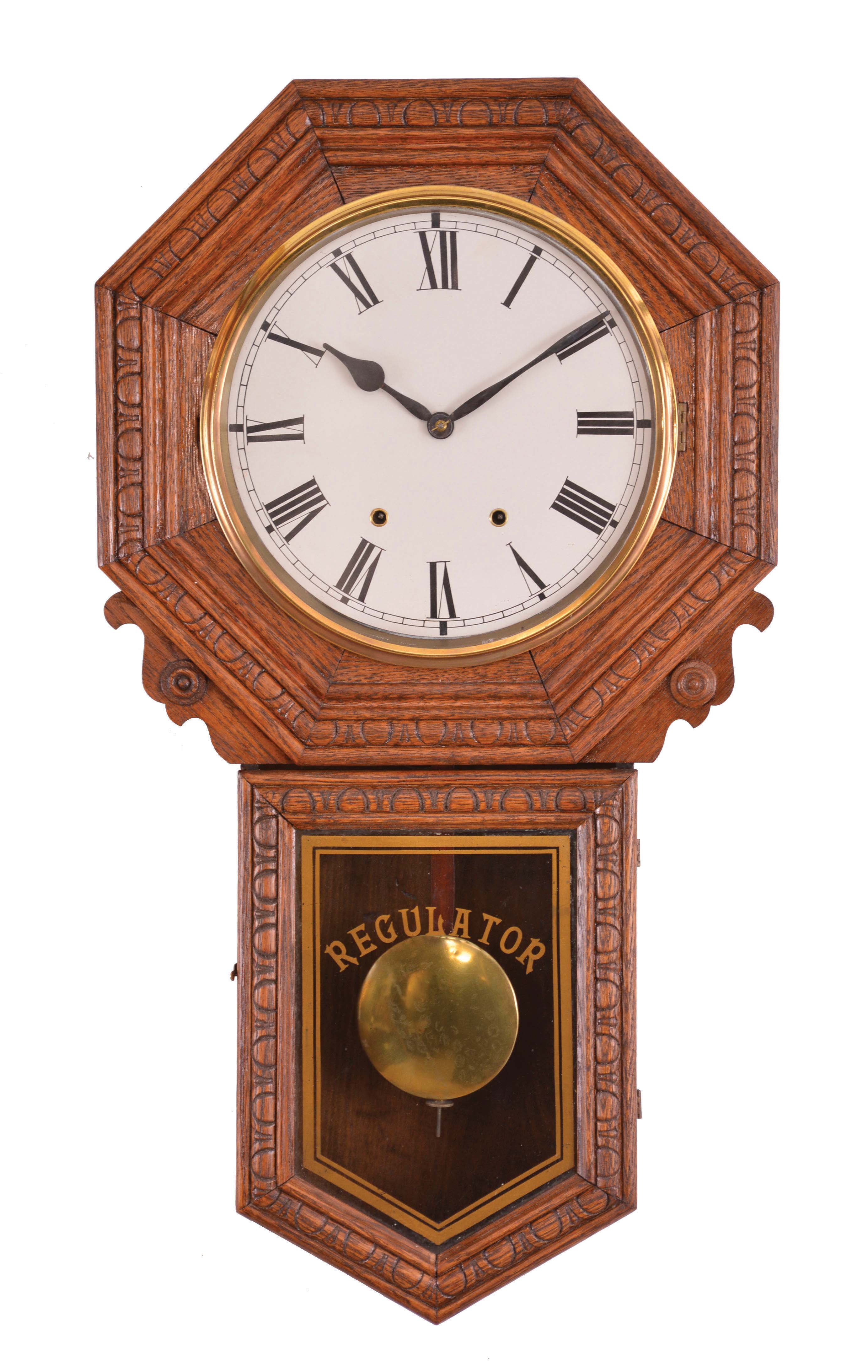 Clocks- 2 (Two): (1) New Haven Clock Co., New Haven, Conn., "Bank Regulator", 8 day, time and strike, spring brass movement long drop wall clock, c1911 (2) E. N. Welch Mfg. Co., Forestville, Conn., "Star Pointer Calendar" variant, 8 day, spring brass movement calendar long drop wall timepiece. This model was made for the American Wringer Co., New York, c1900. — Antique Clocks Price Guide