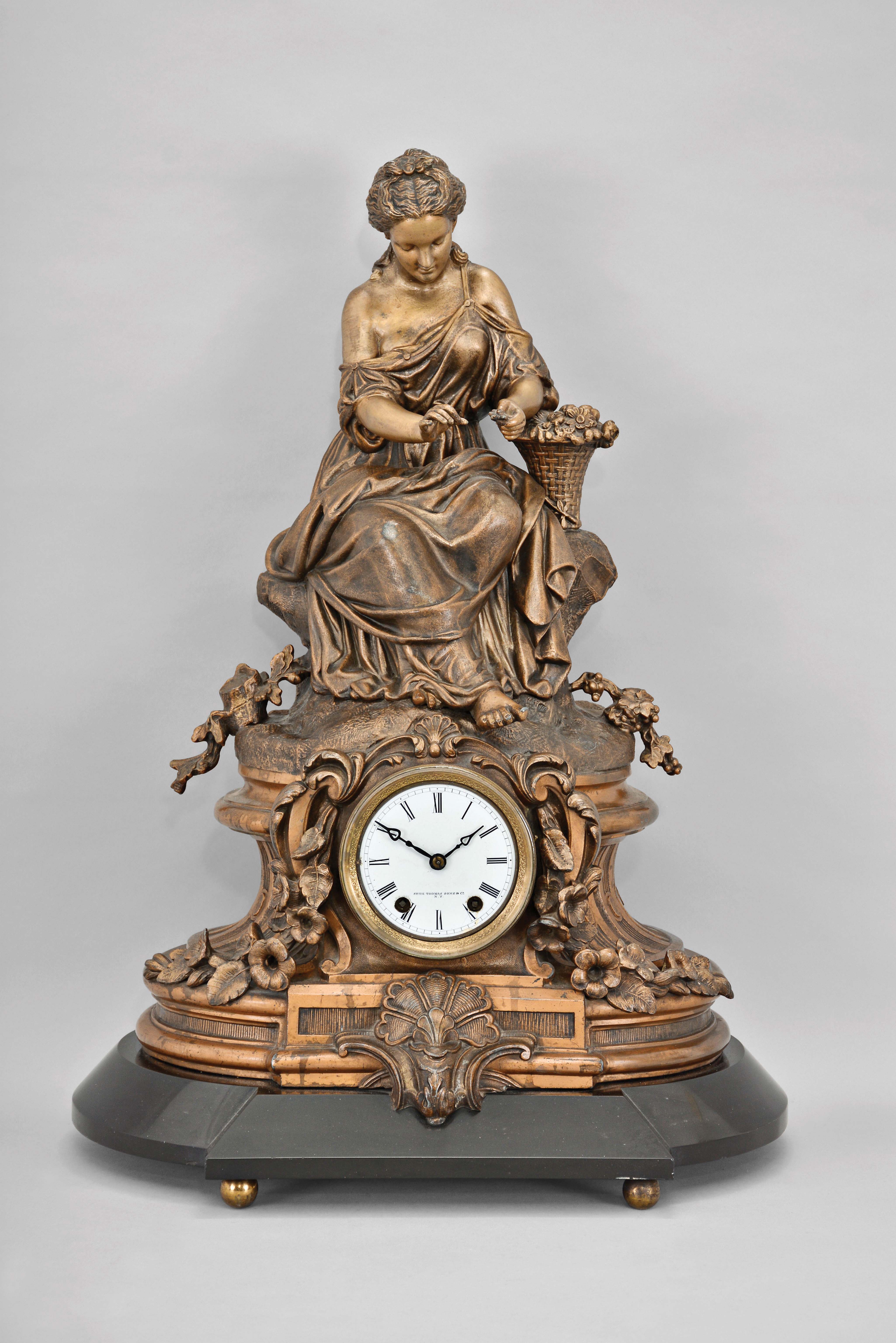 Seth Thomas Sons & Co., New York, "8029" shelf clock with a spring driven 15 day time and half hour strike movement in a bronzed finish spelter case. — Antique Clocks Price Guide